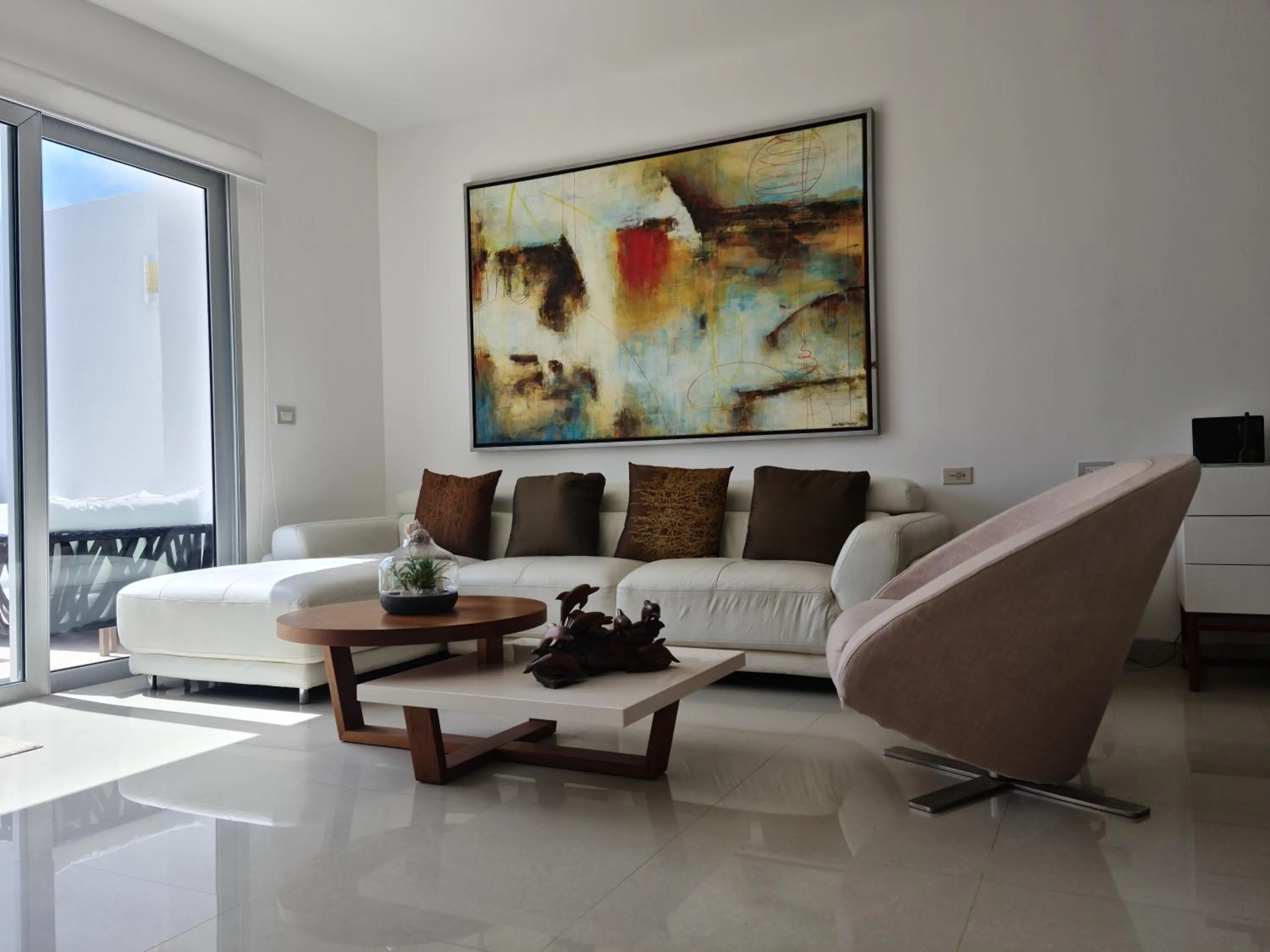 Living room in Luxury ocean view penthouse and private beach club