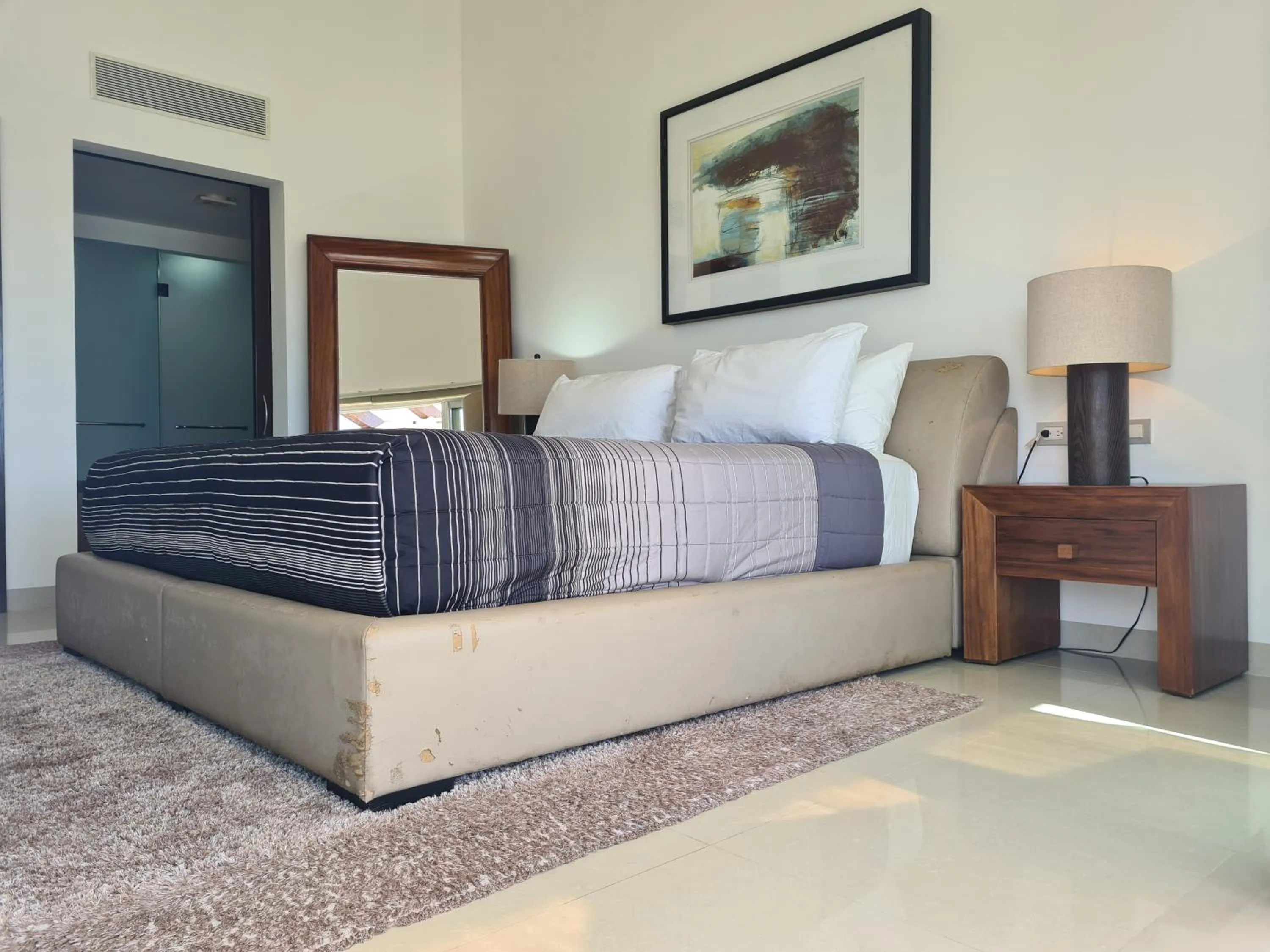 Bed in Luxury ocean view penthouse and private beach club