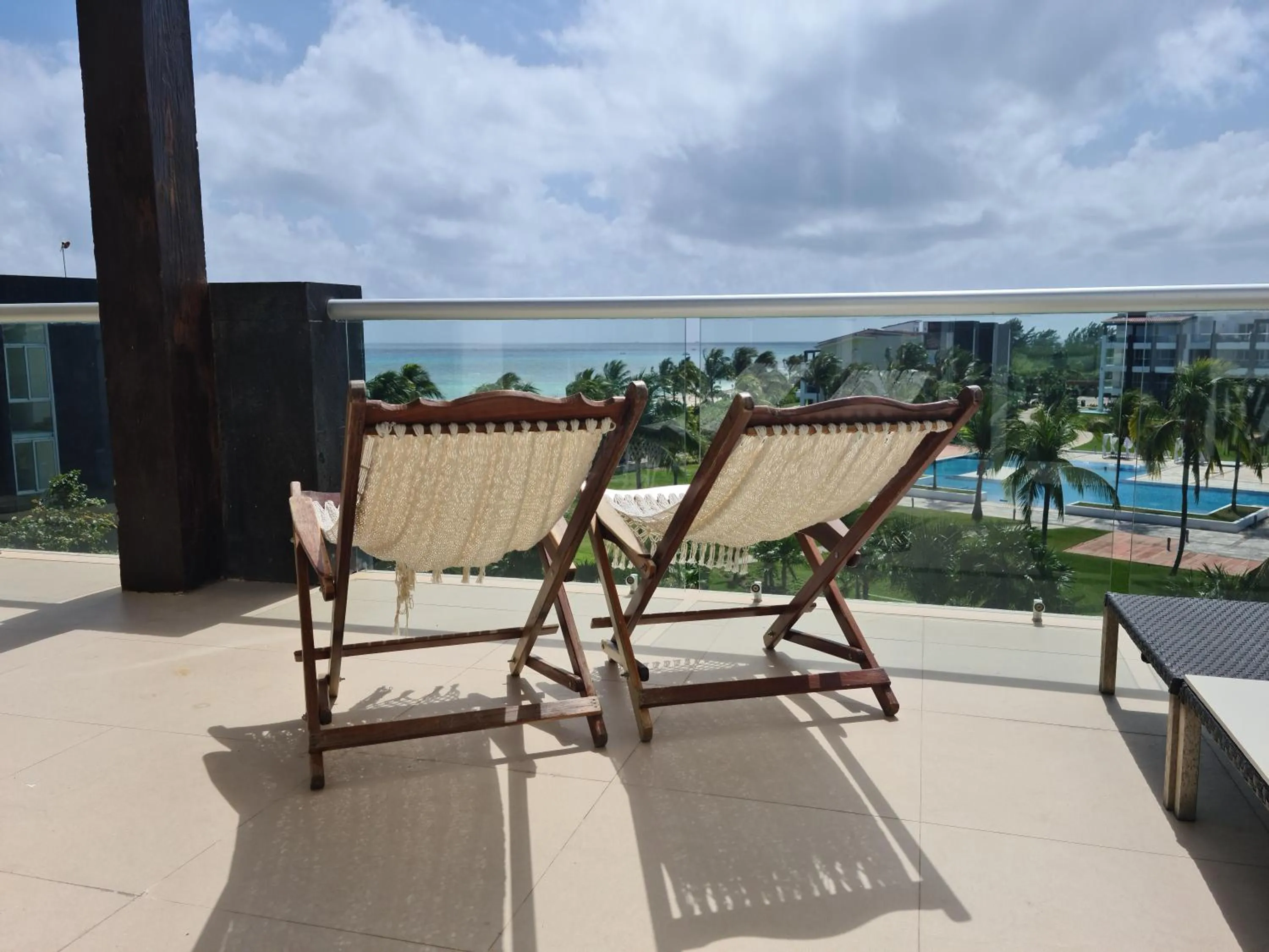 Patio in Luxury ocean view penthouse and private beach club