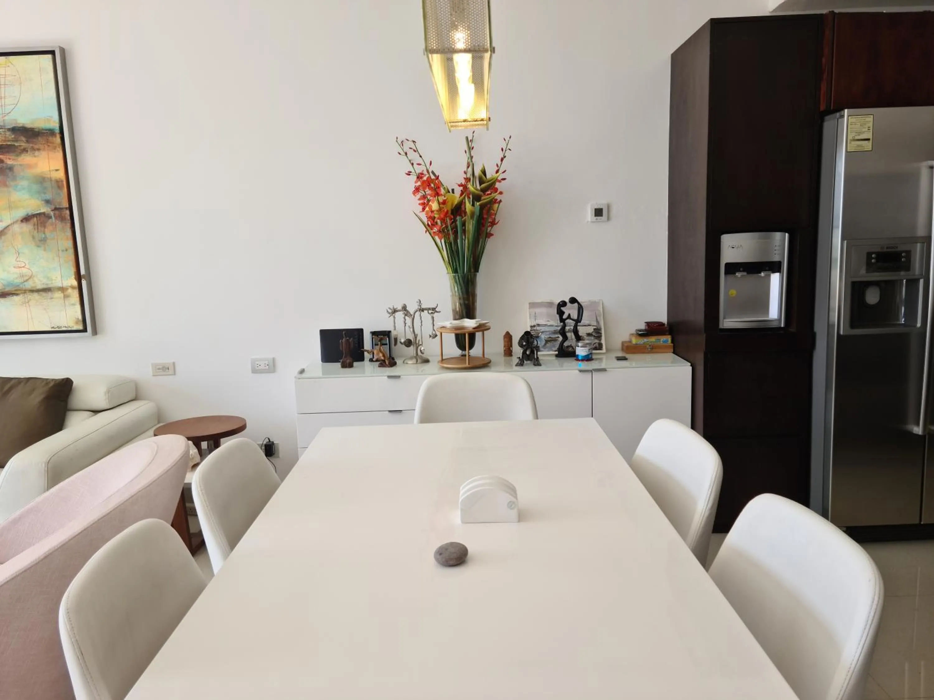 Dining area in Luxury ocean view penthouse and private beach club