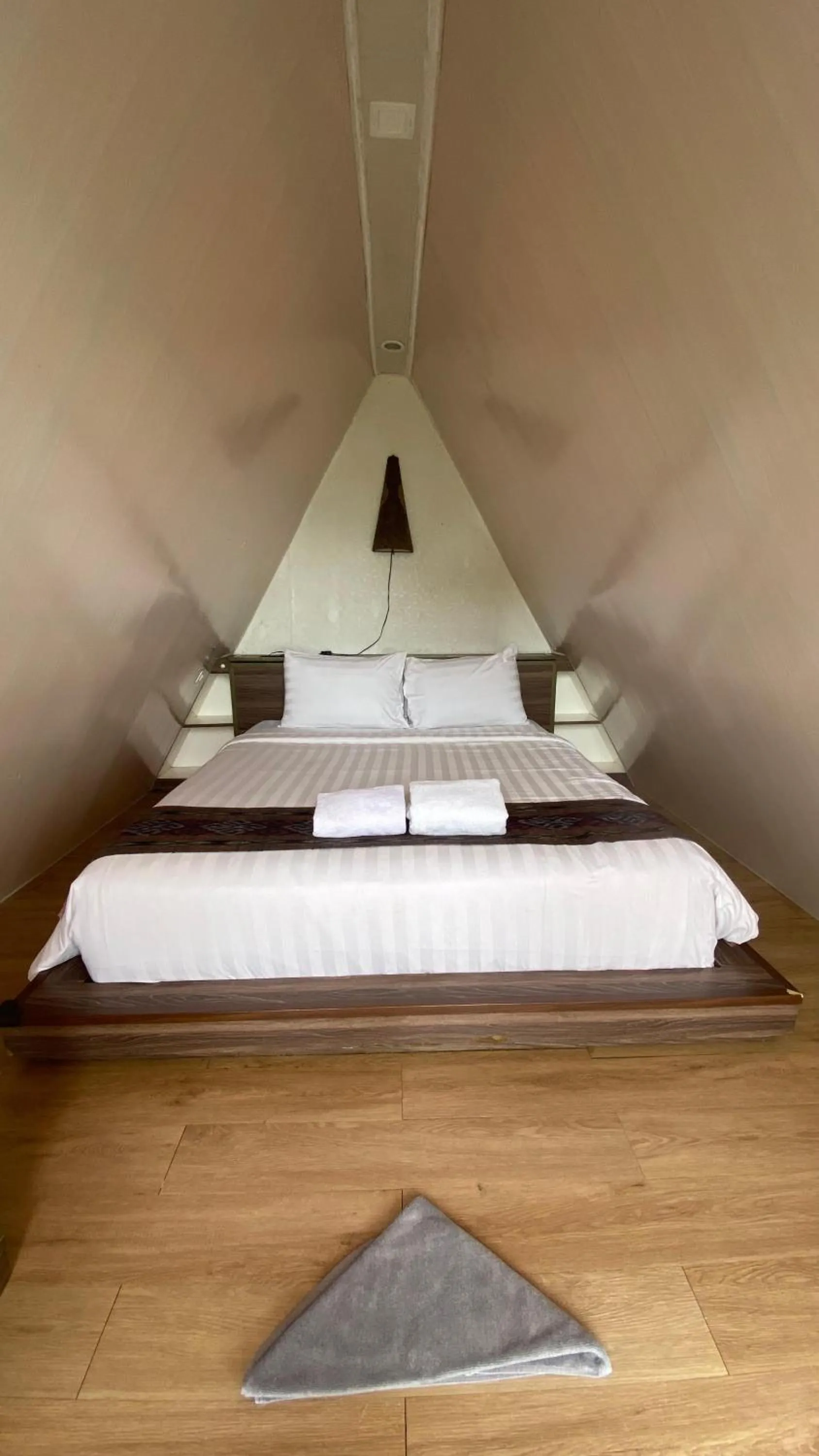 Bed in De Pointé Resort & Resto