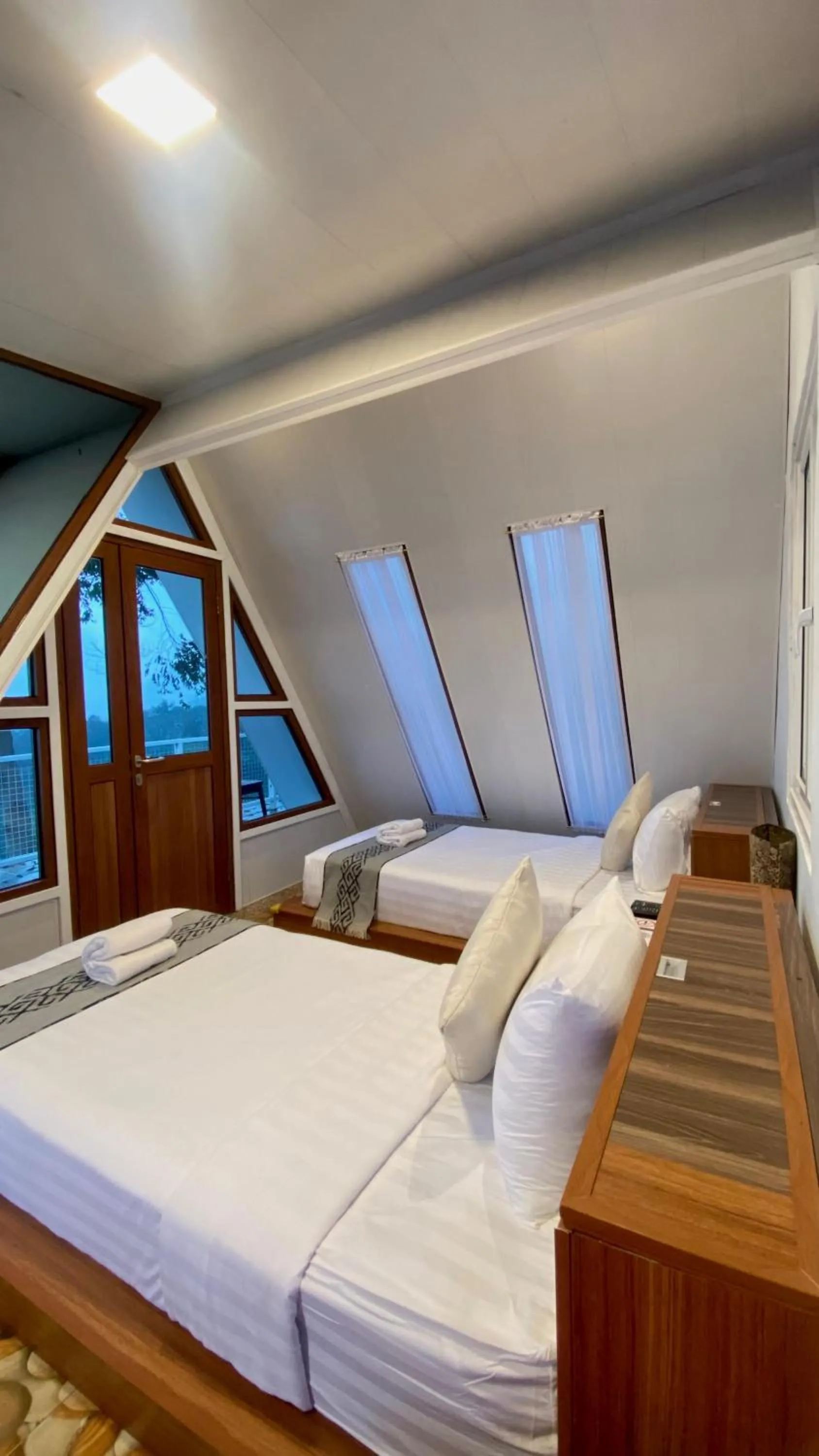 Bed in De Pointé Resort & Resto