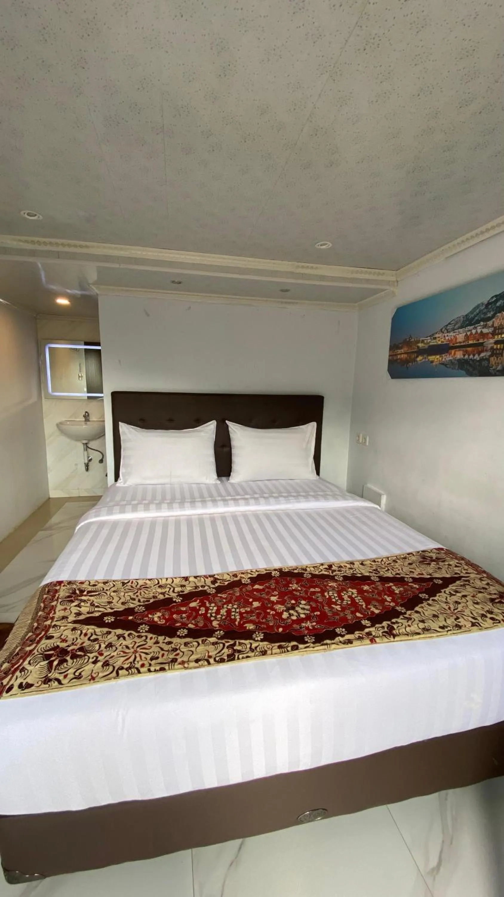 Bed in De Pointé Resort & Resto