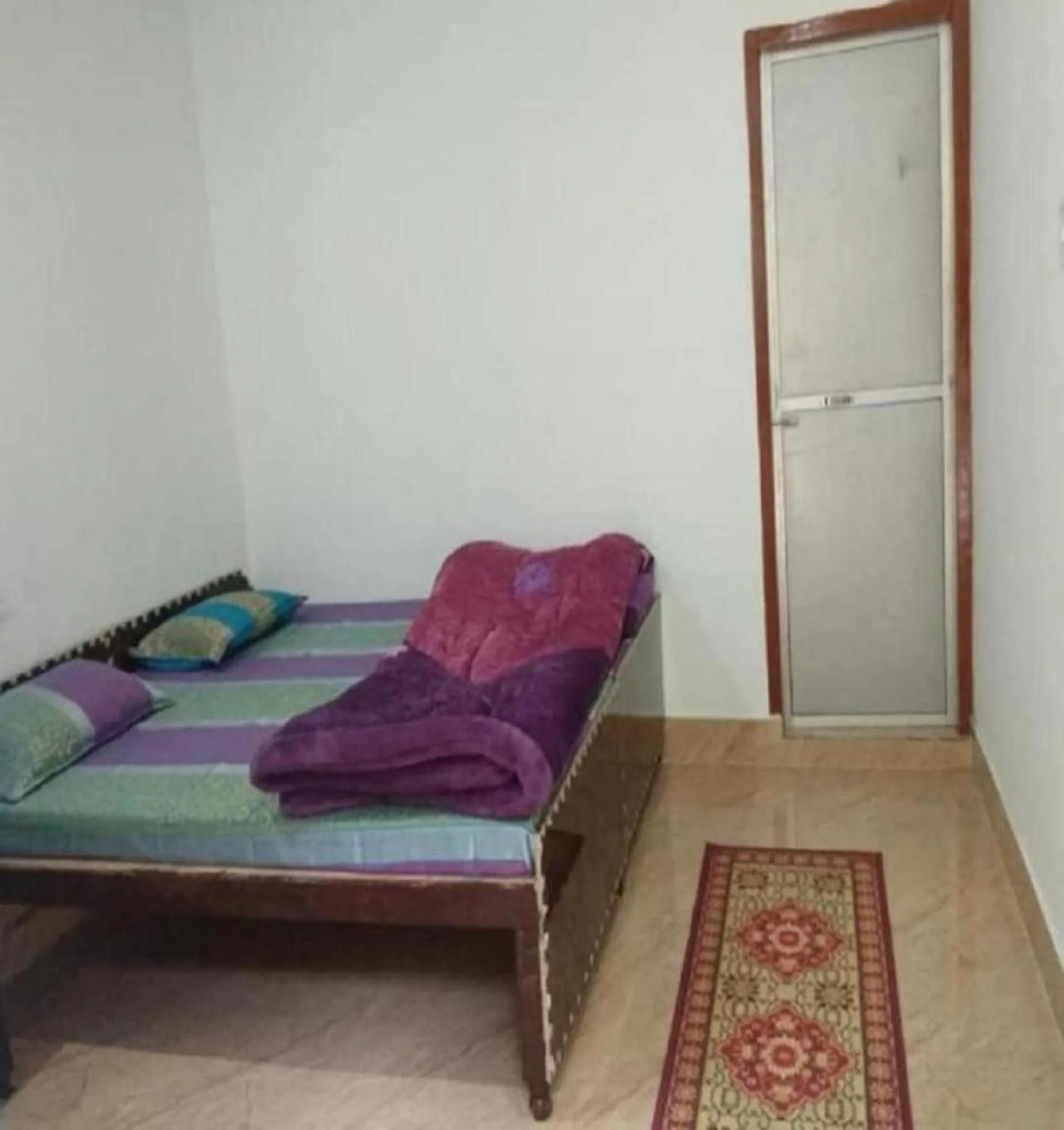 Bedroom, Bed in HOTEL PUSPWAN AND RESTAURANT by StayApart