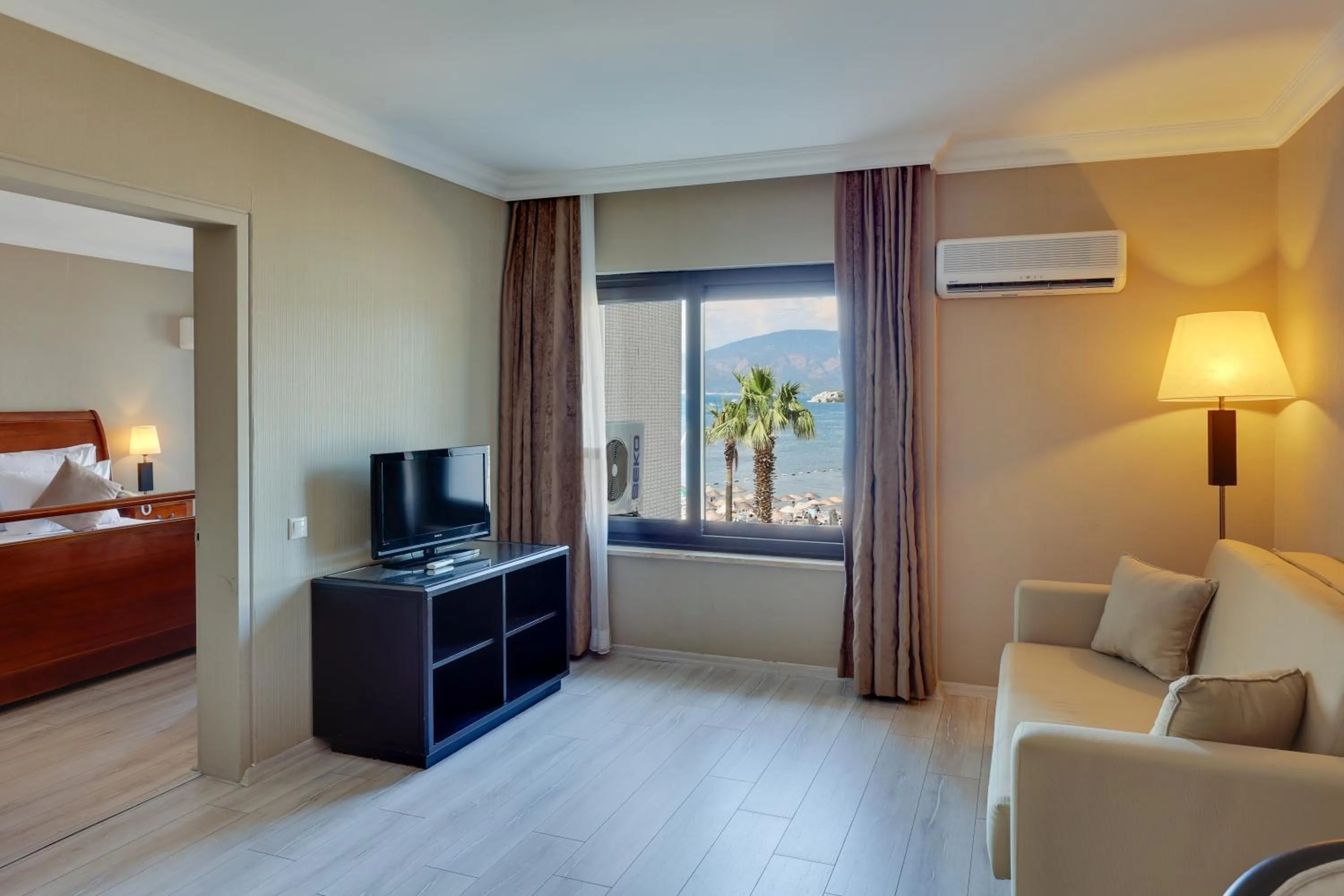 Living room, Bed in Faros Premium Beach