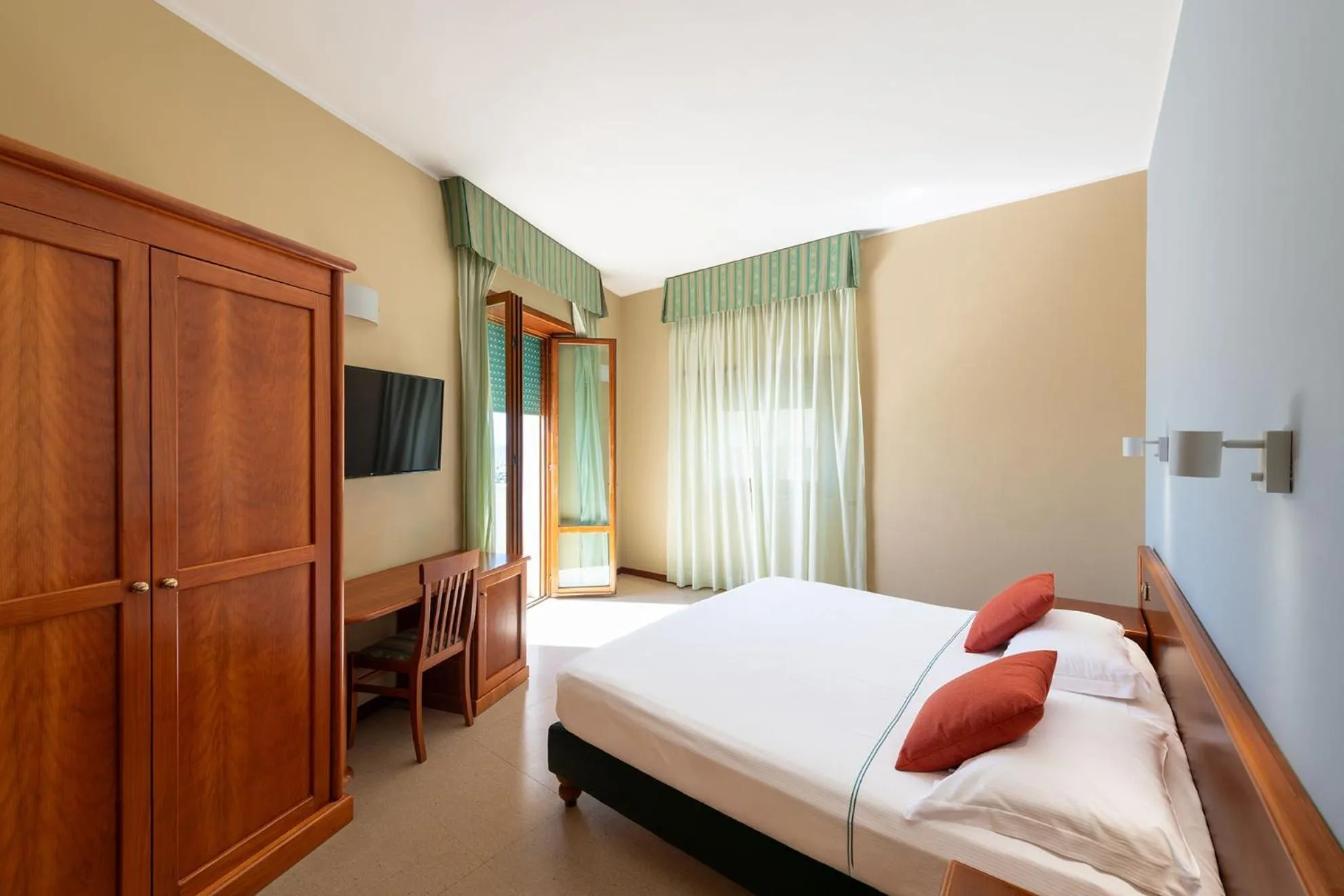 Bed in Astura Palace Hotel