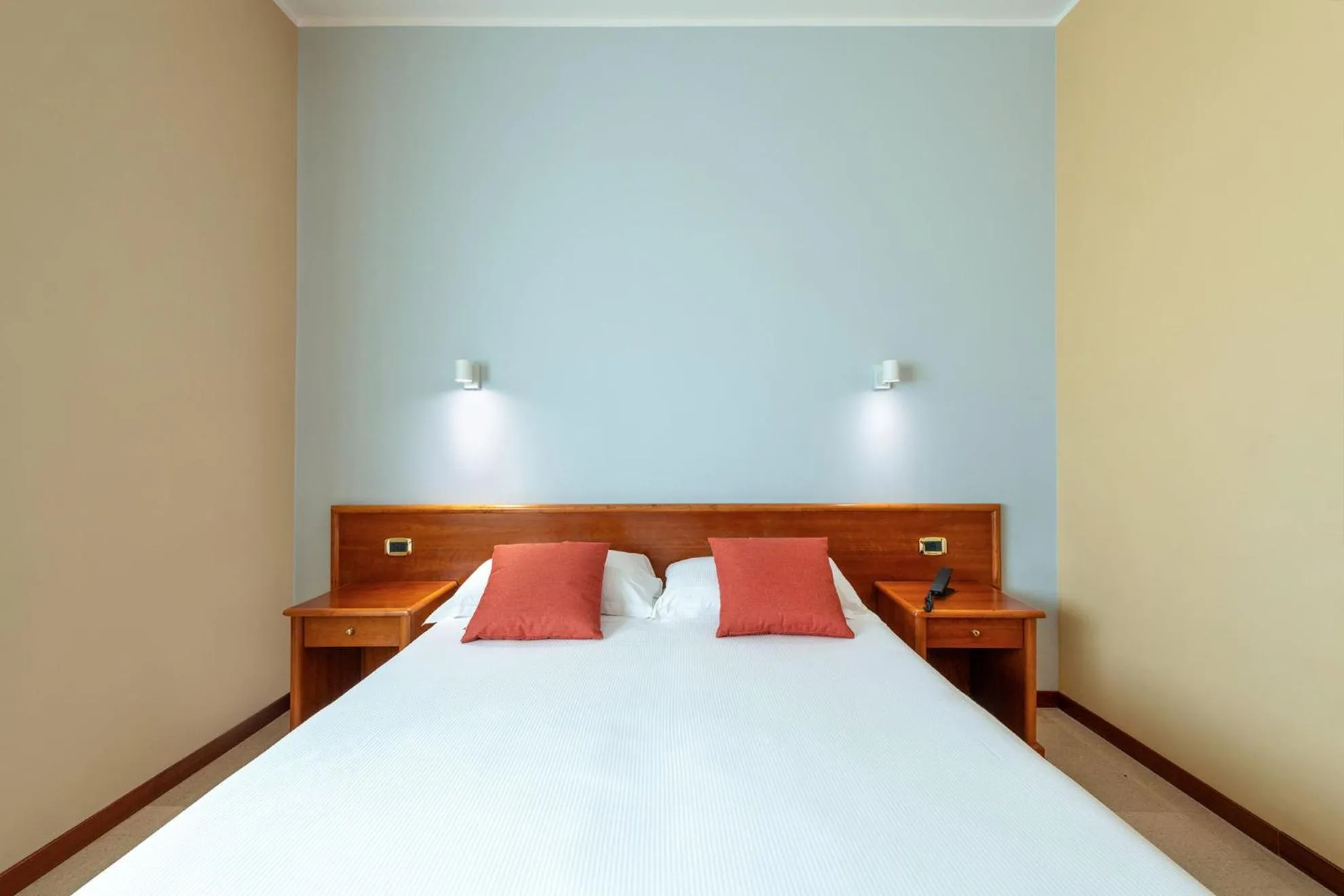 Bed in Astura Palace Hotel