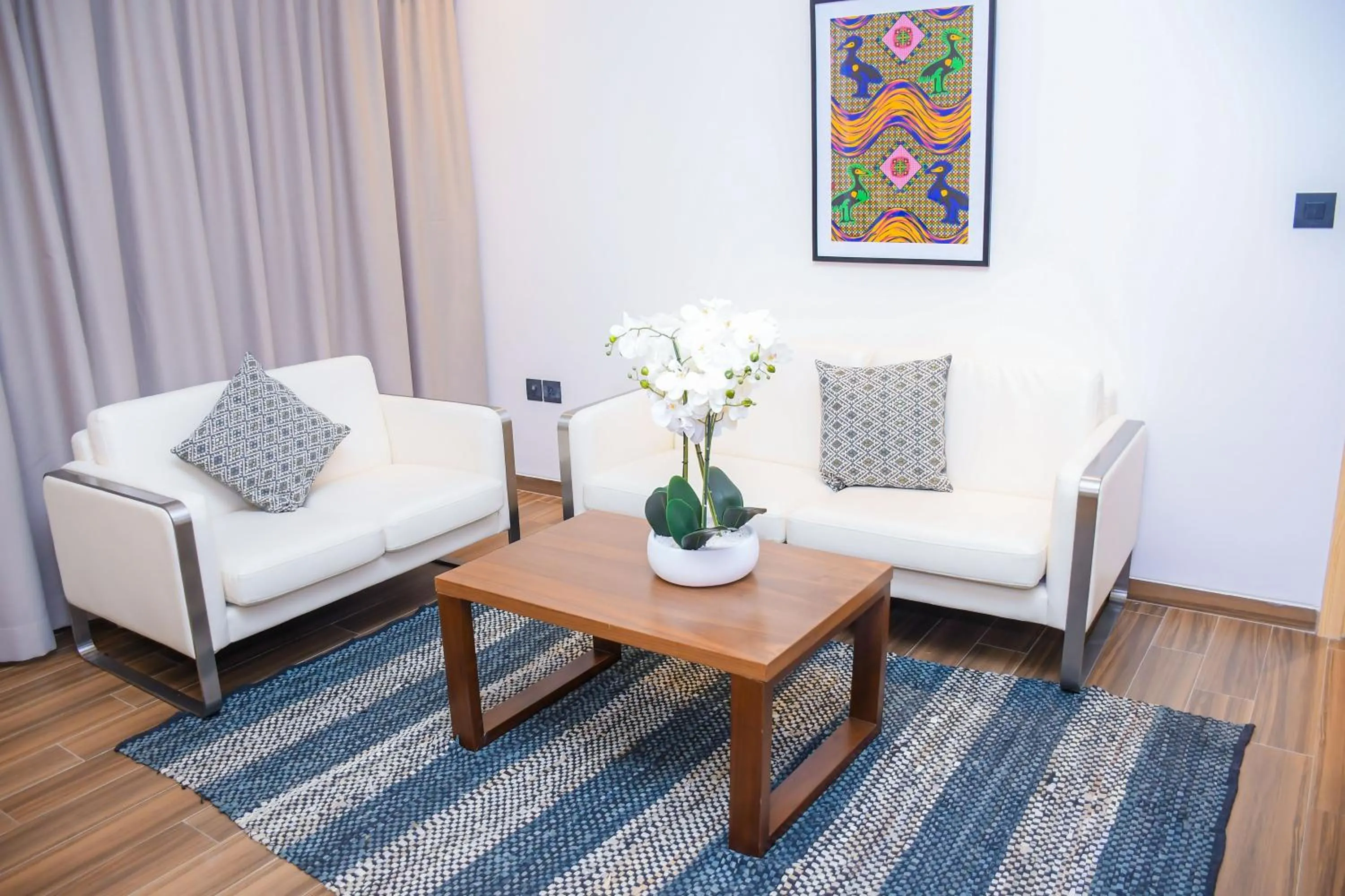 Living room in AQUA INN Hotel