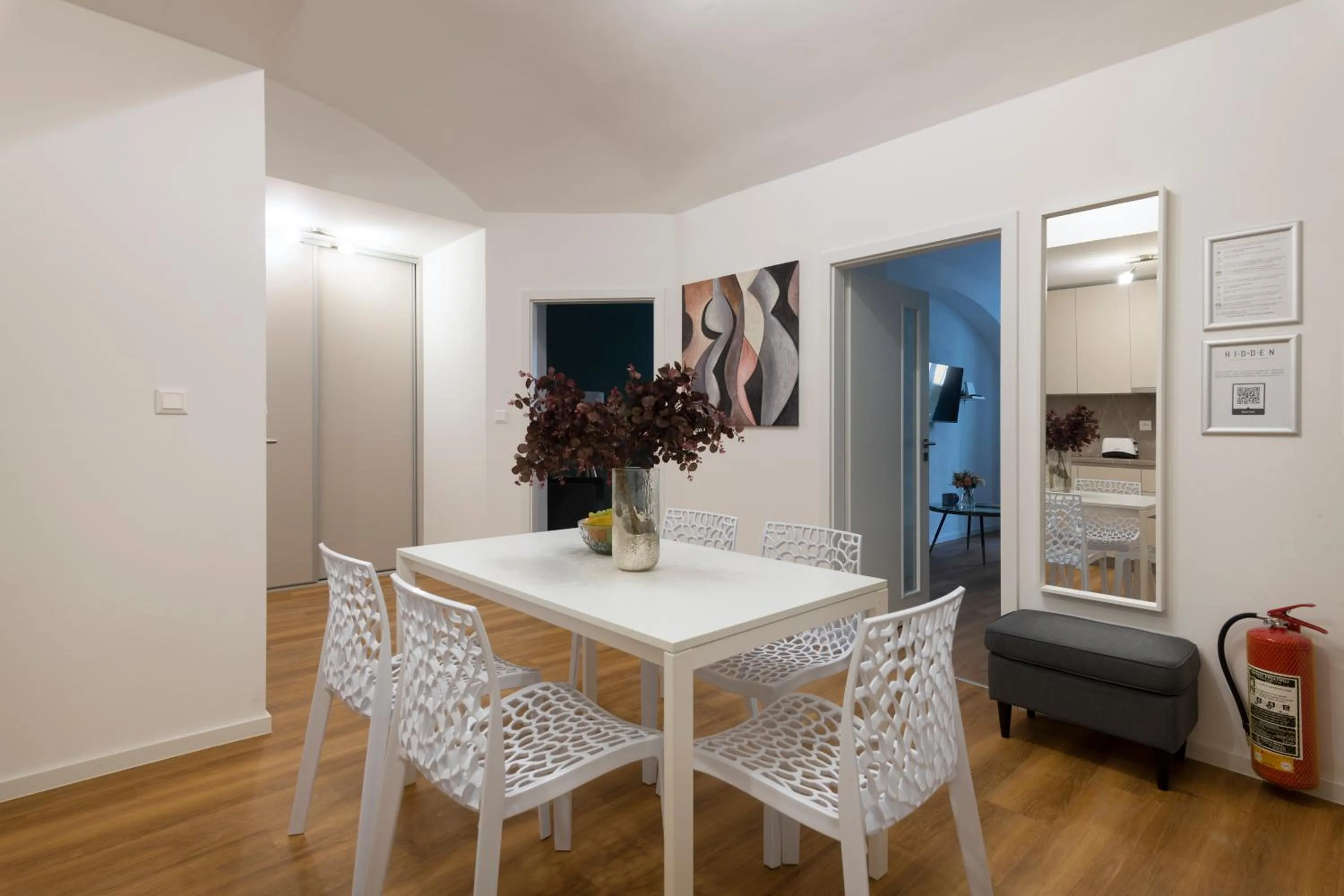 Dining area in Hidden Art Boutique Residence by Dwellfort