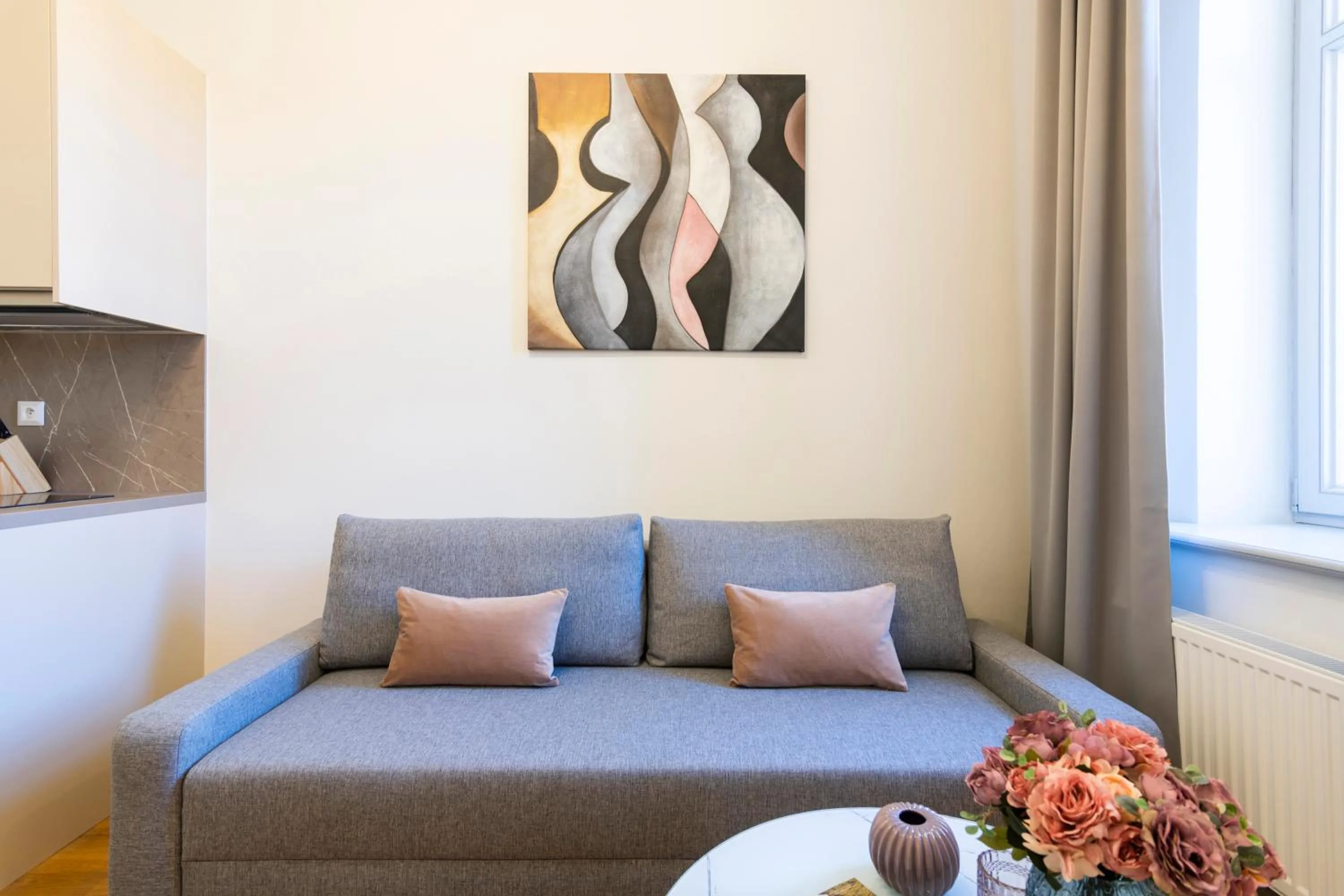 Living room in Hidden Art Boutique Residence by Dwellfort