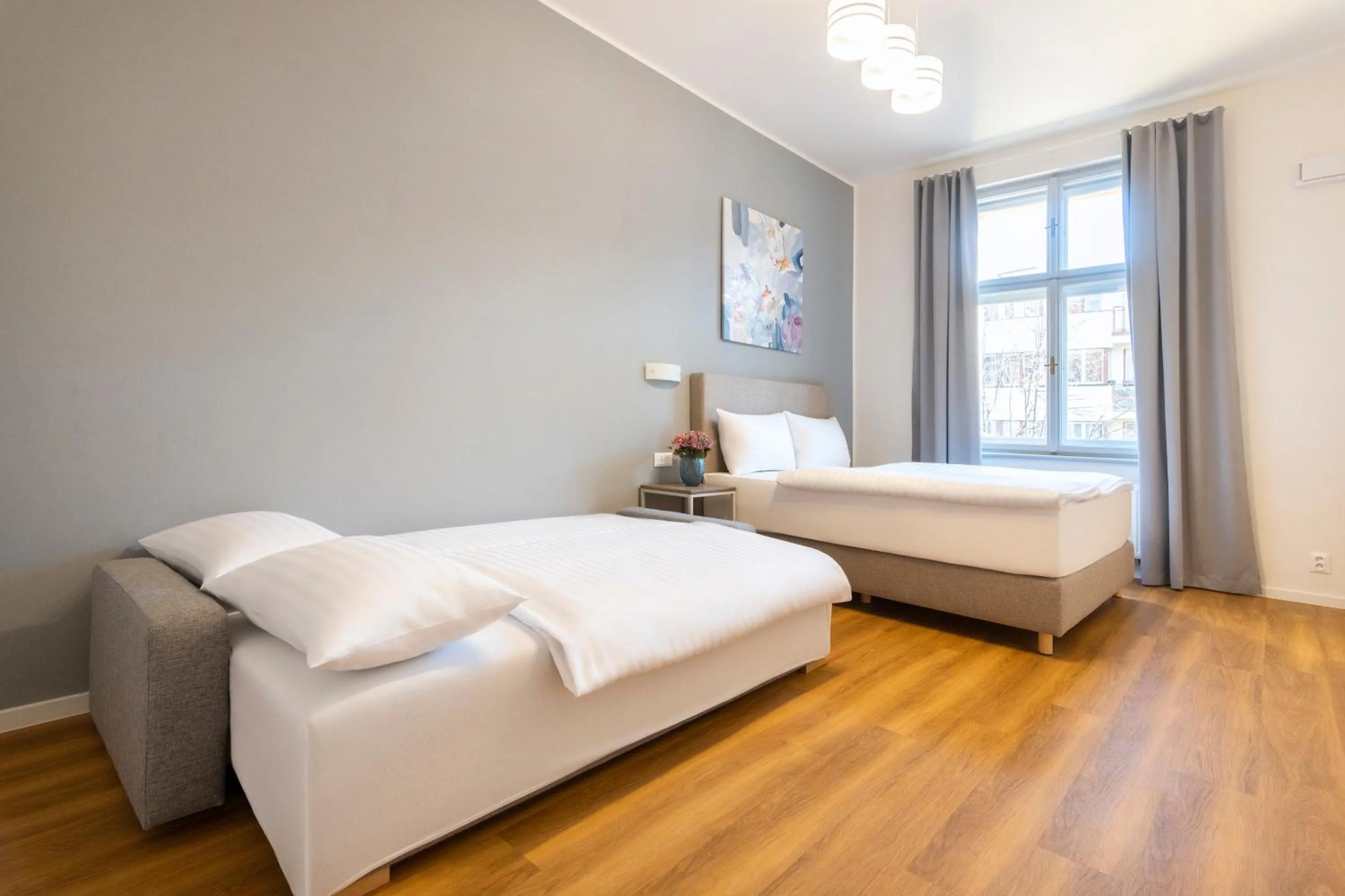 Bed in Hidden Art Boutique Residence by Dwellfort