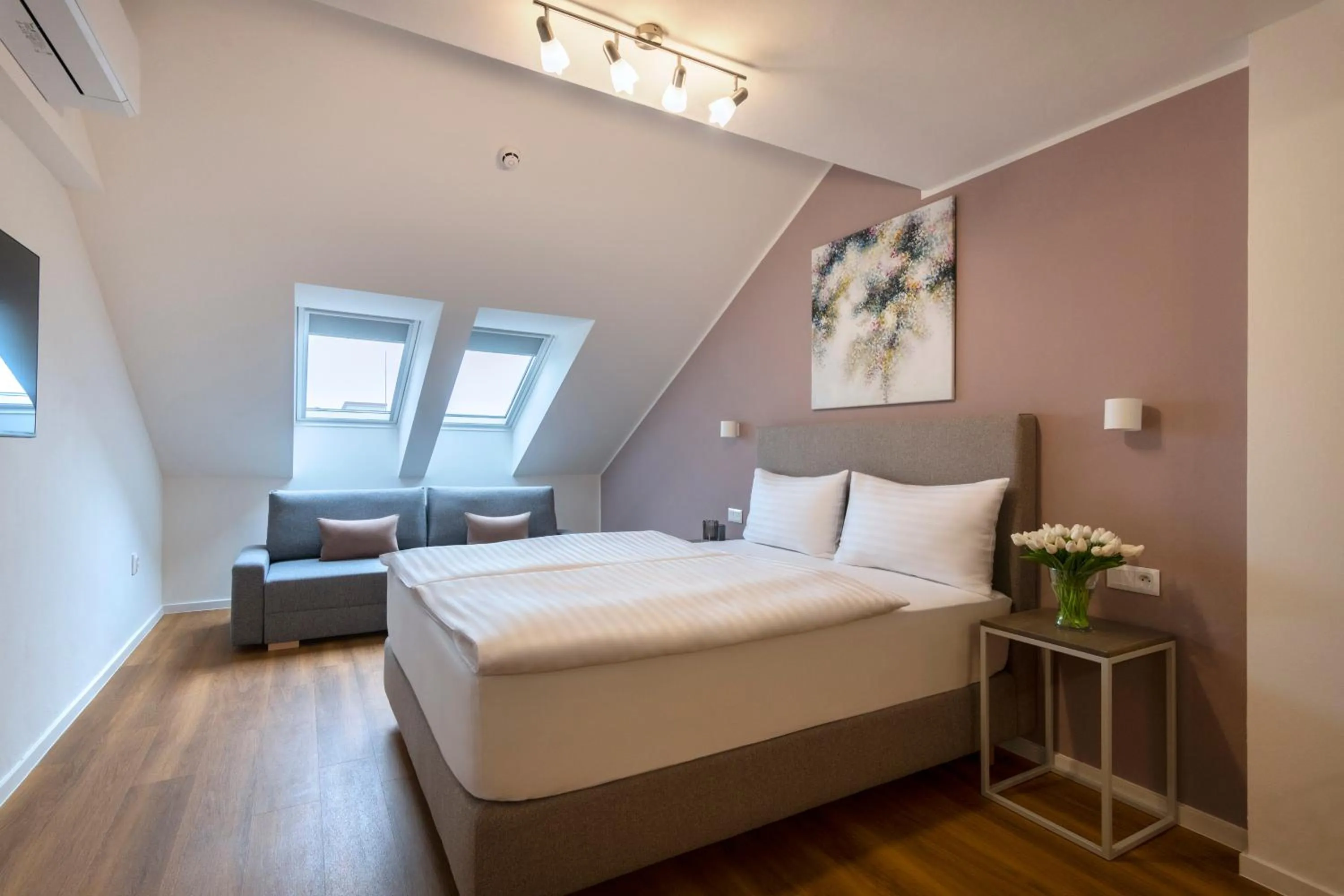 Bed in Hidden Art Boutique Residence by Dwellfort