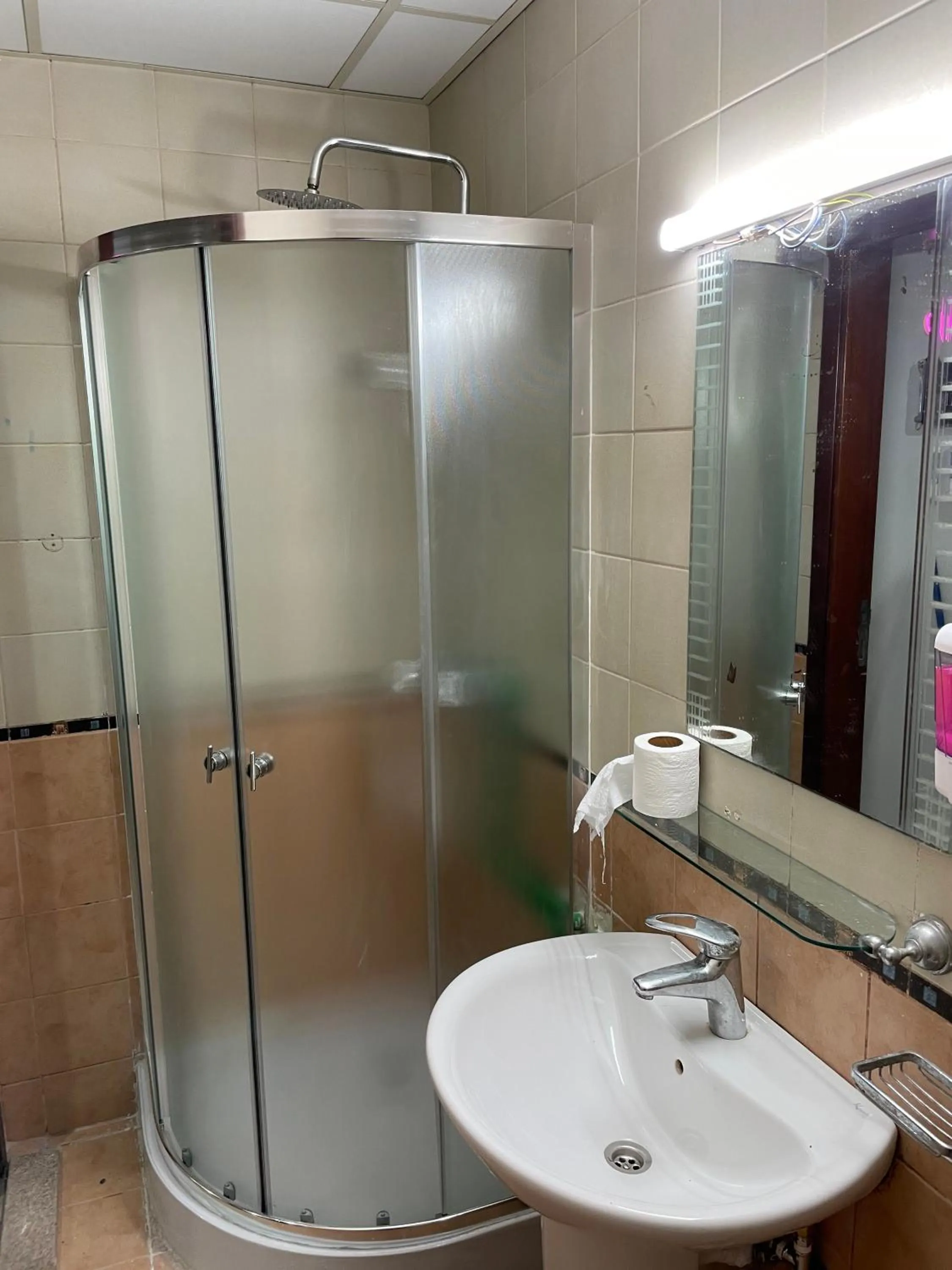 Shower in AlBarsha 1 Hostel by PHM