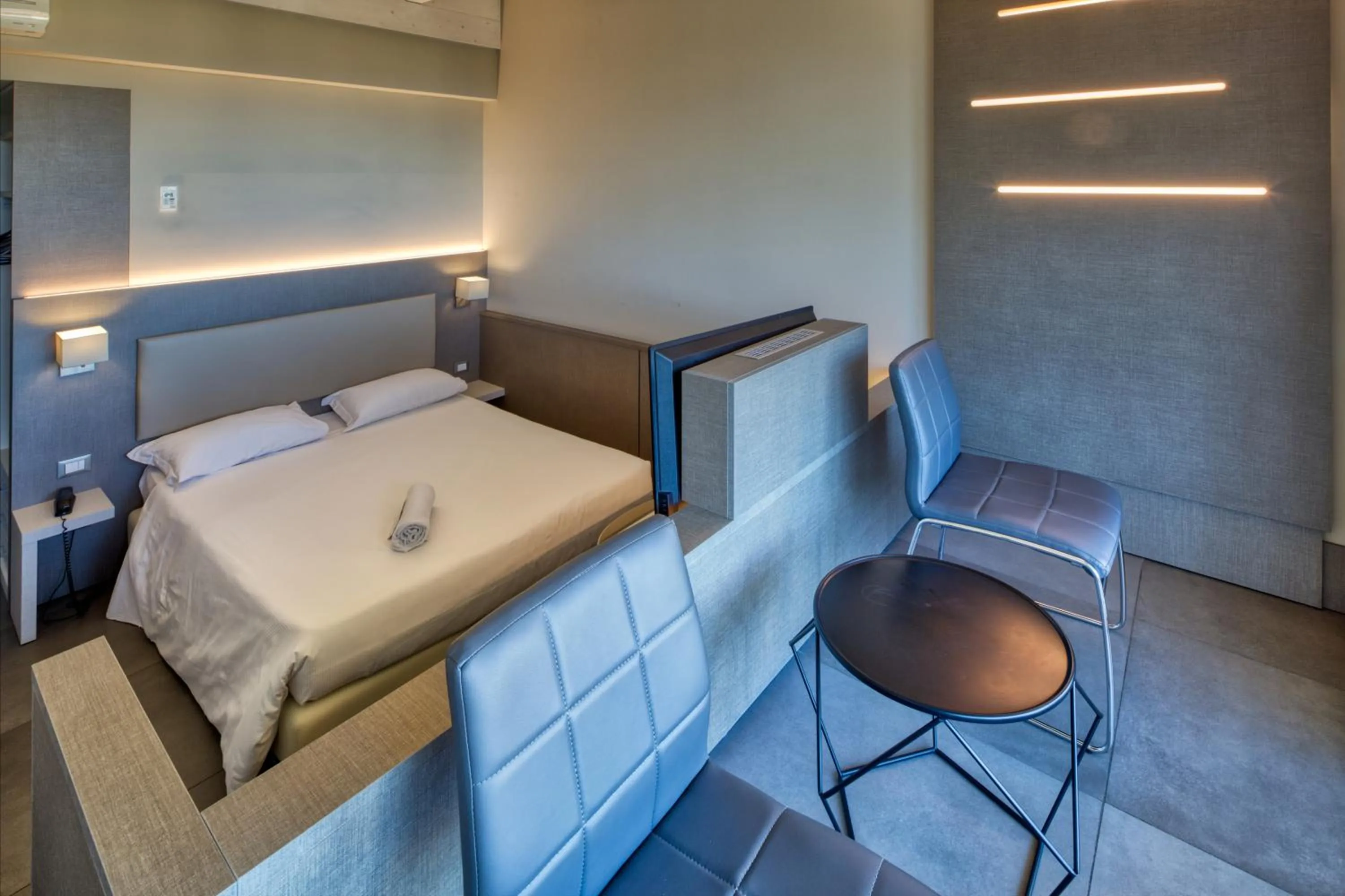 Bedroom, Bed in Poggio Hotel