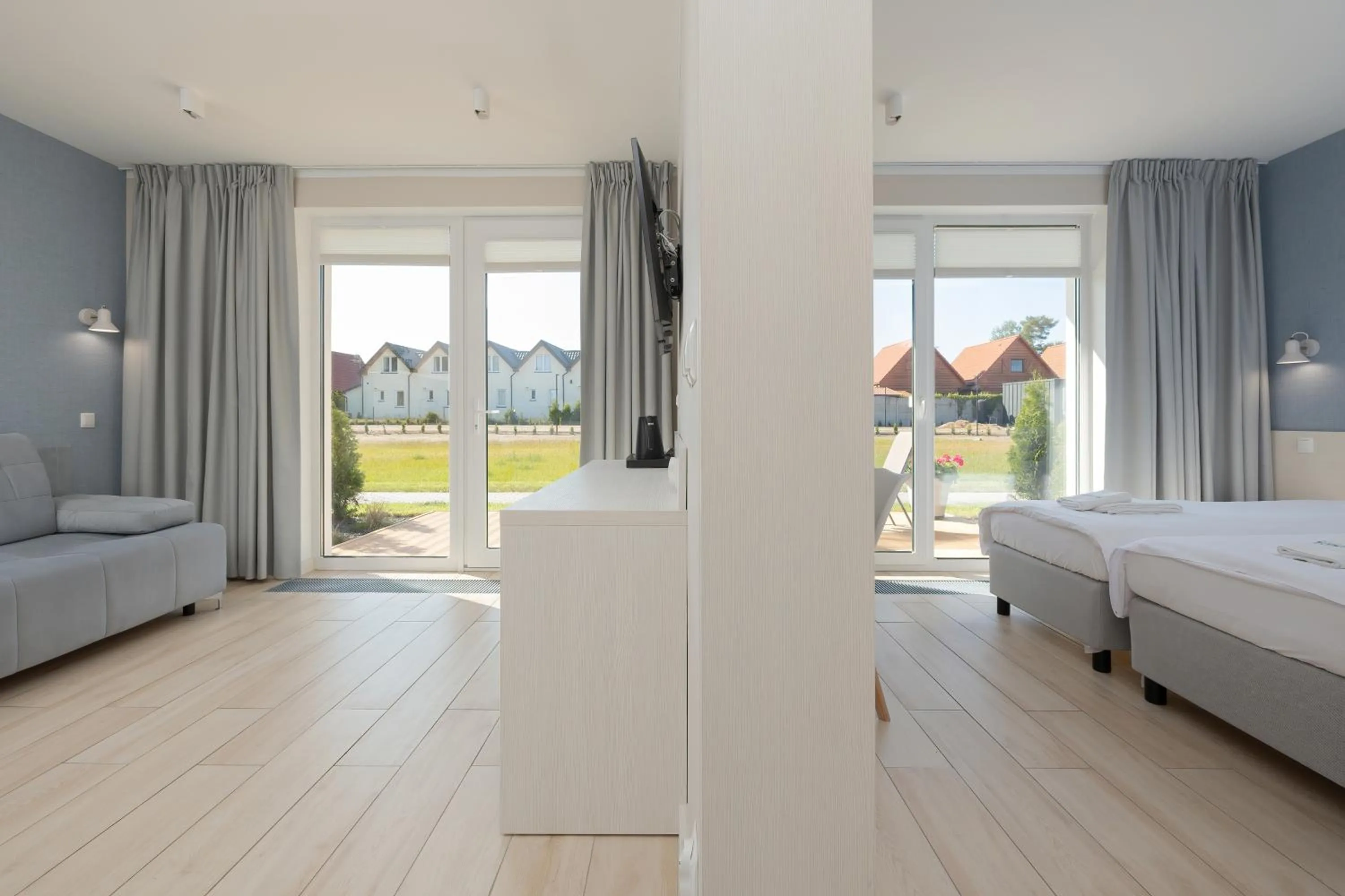 Living room, Bed in BURSZTYN - BERNSTEIN APARTMENTS