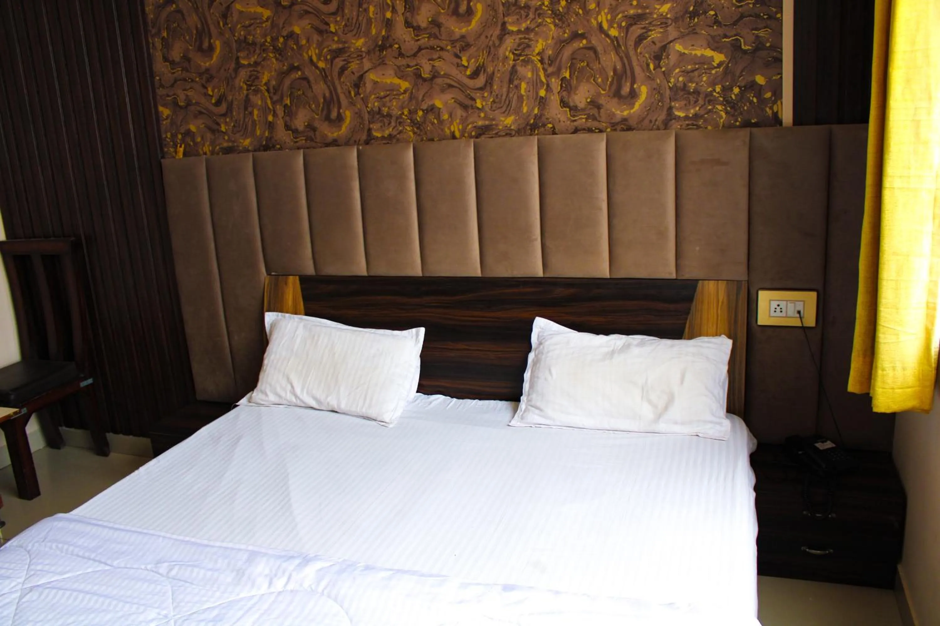 Bed in Sangam Hotel