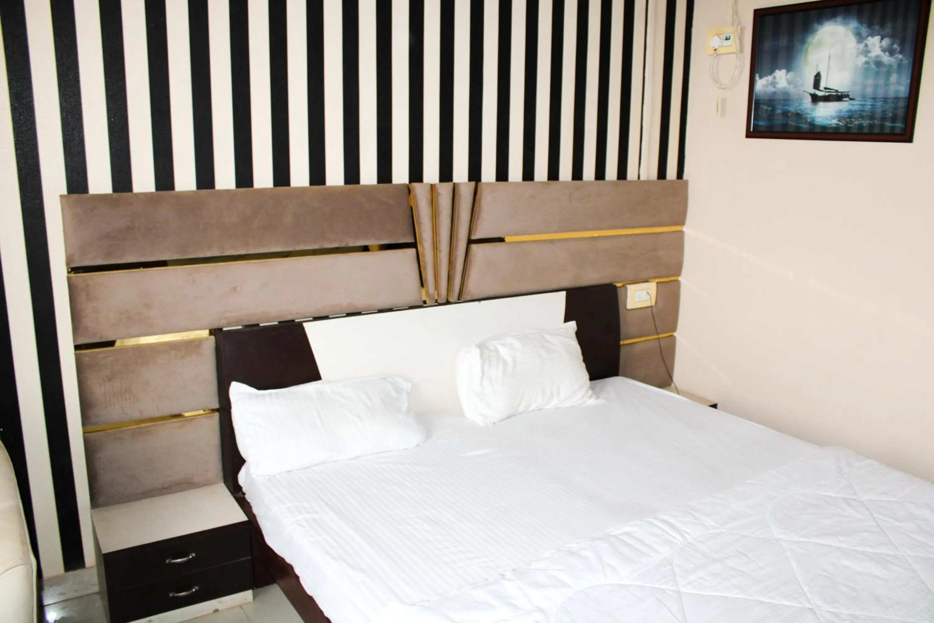 Bed in Sangam Hotel