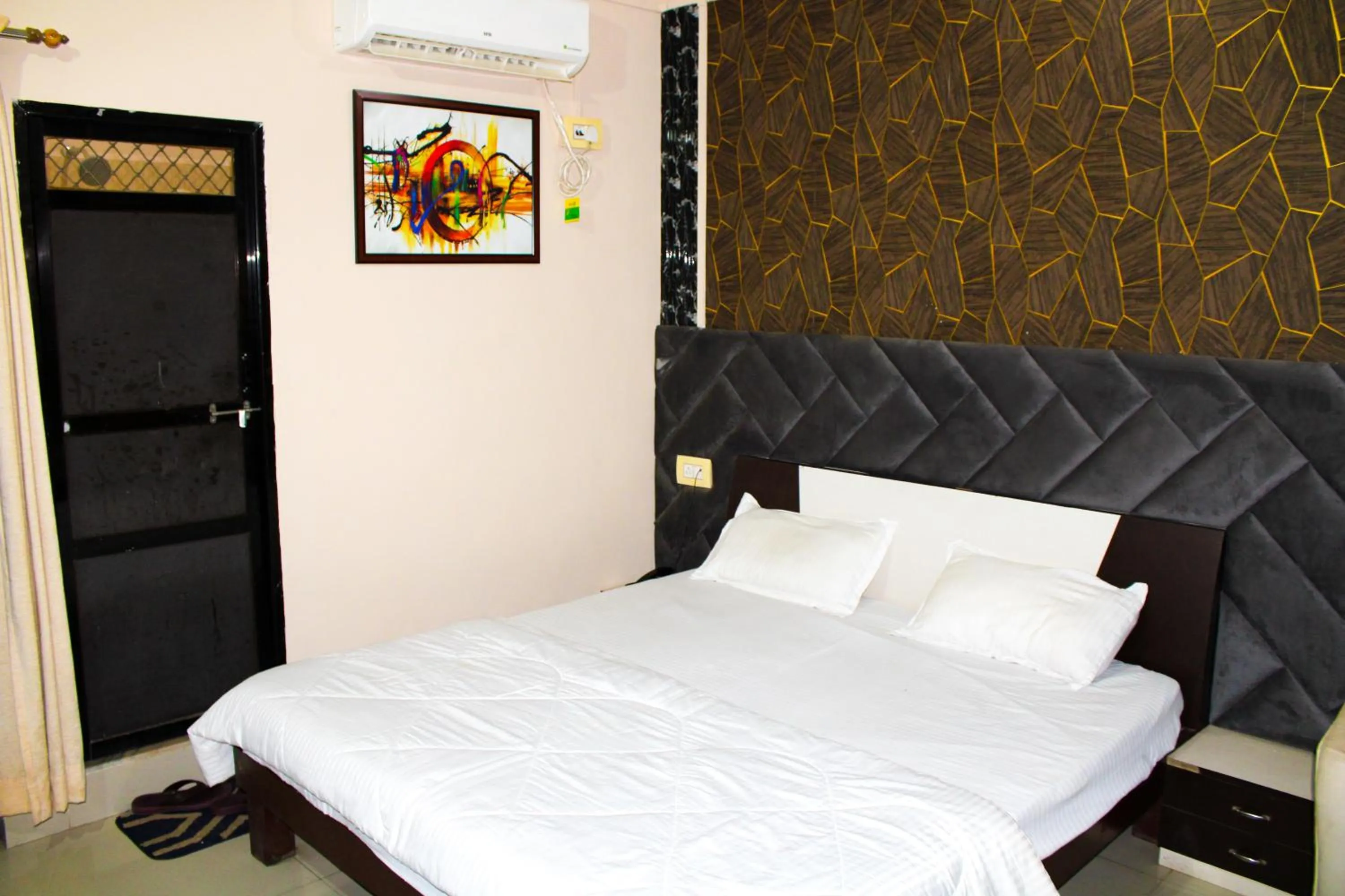 Bed in Sangam Hotel
