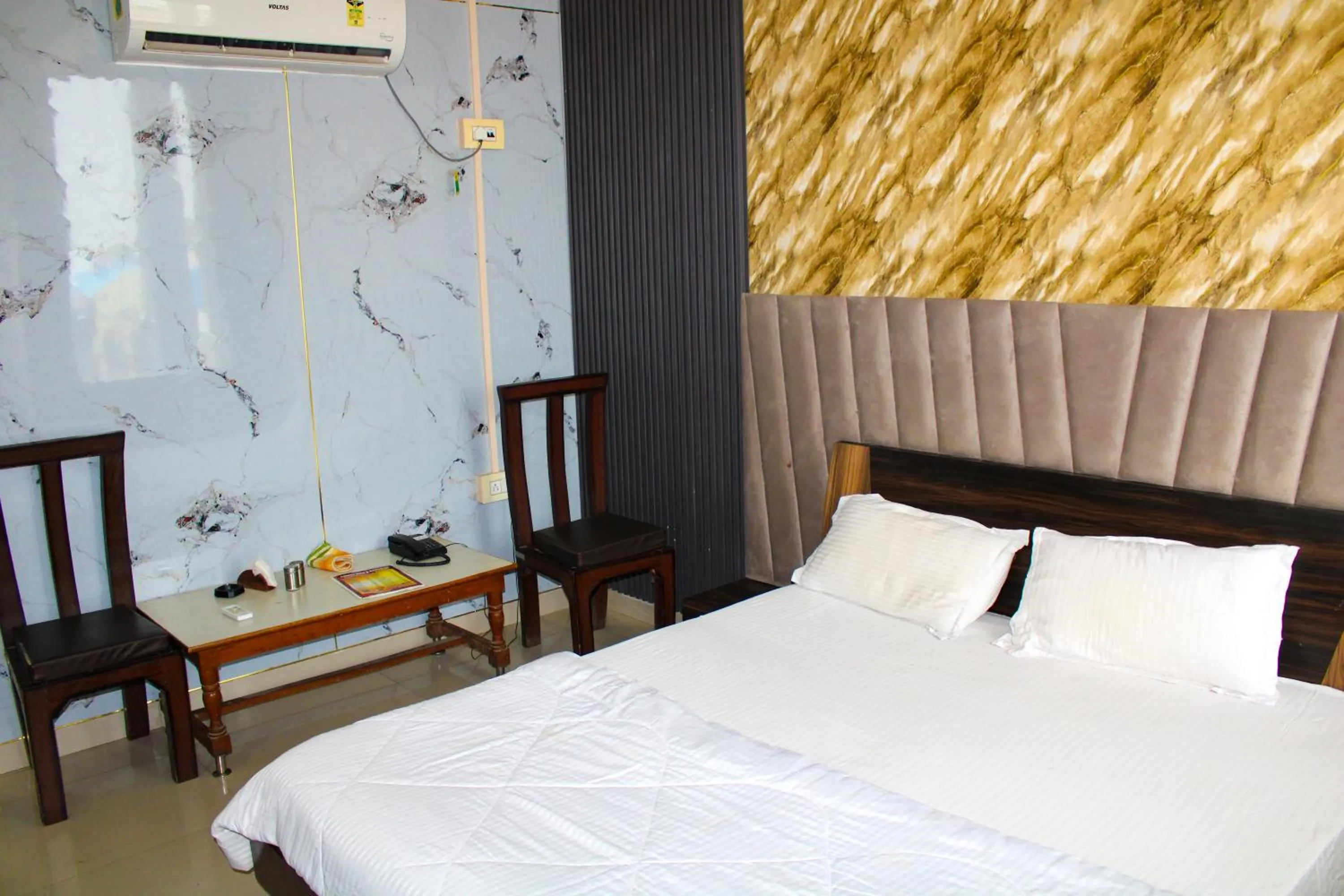 Bed in Sangam Hotel