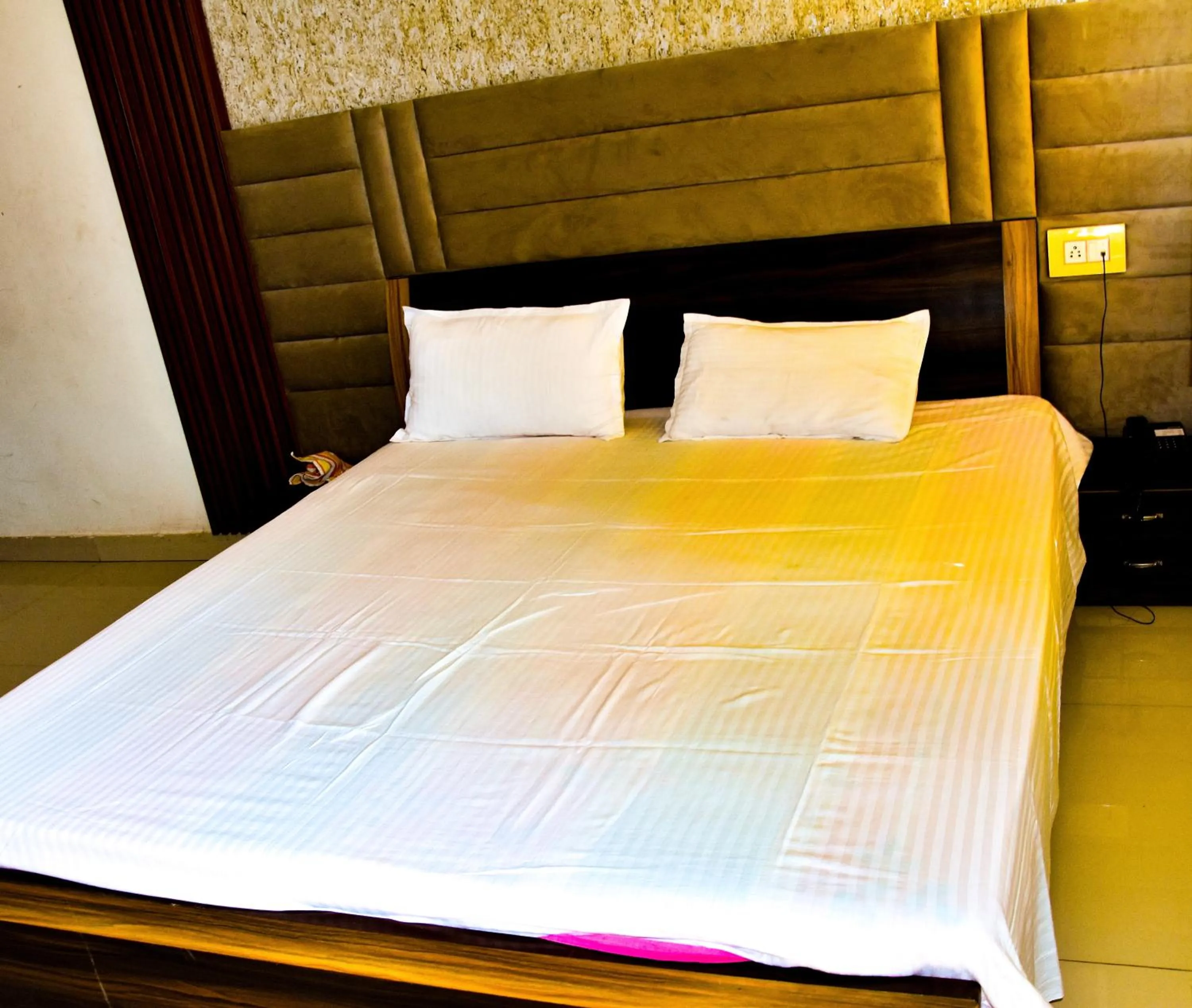 Bed in Sangam Hotel