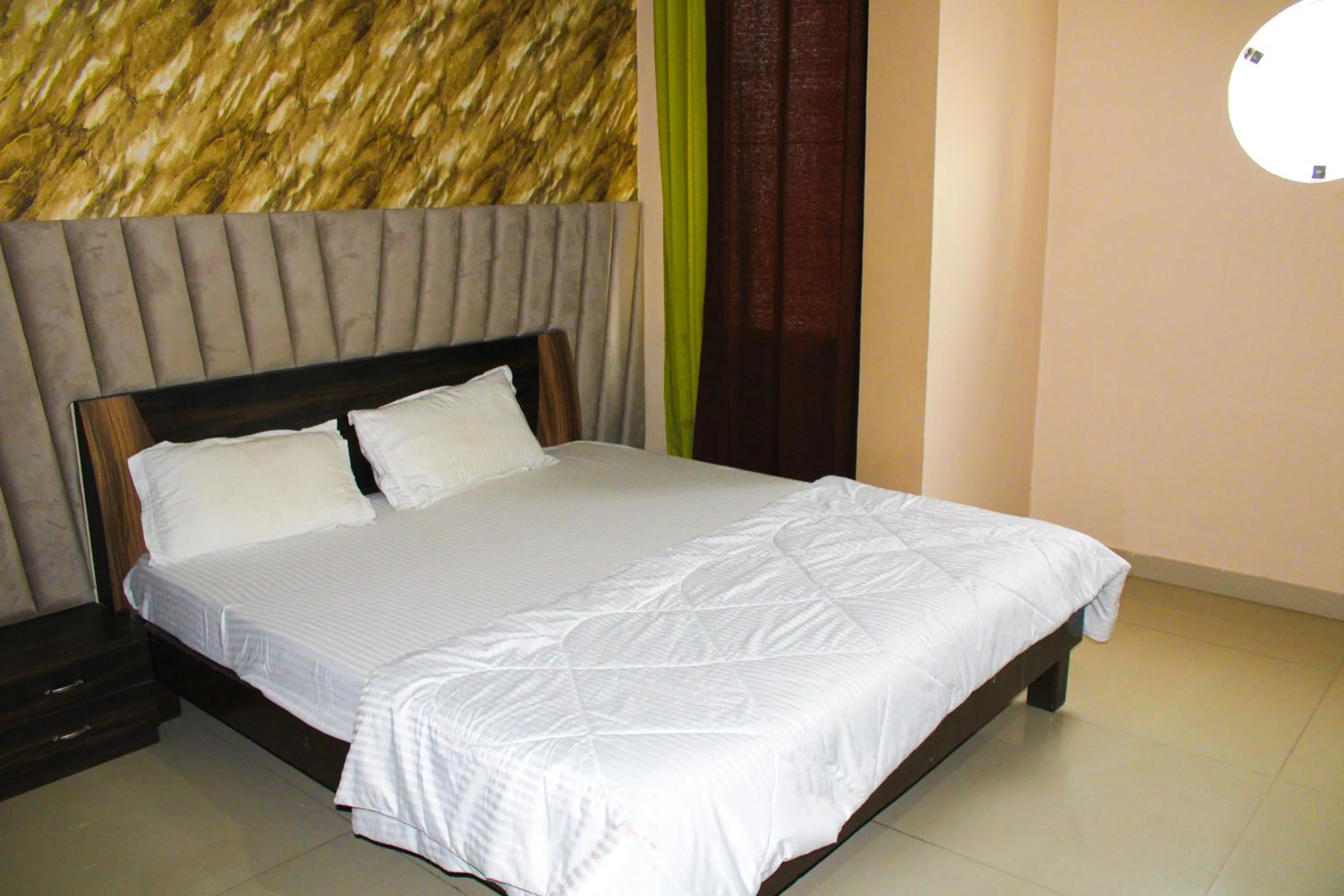 Bed in Sangam Hotel