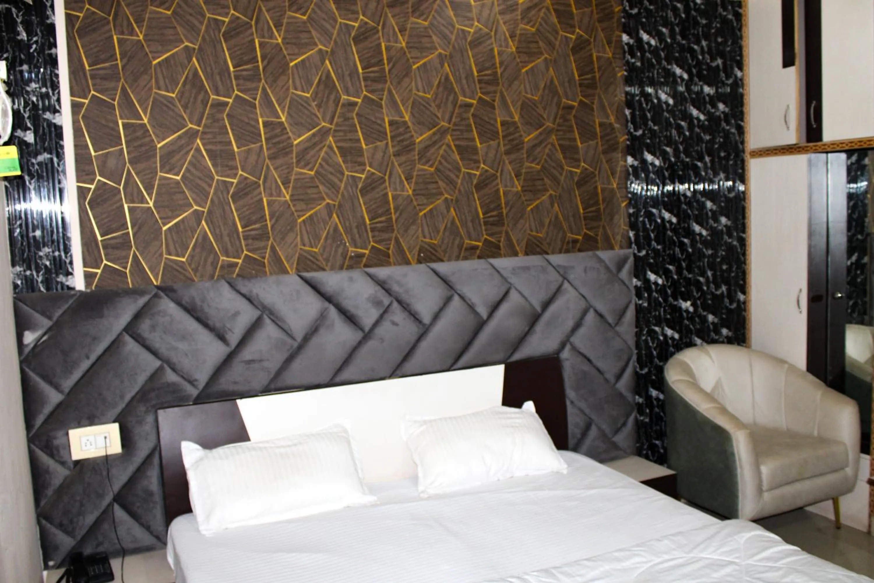 Bed in Sangam Hotel