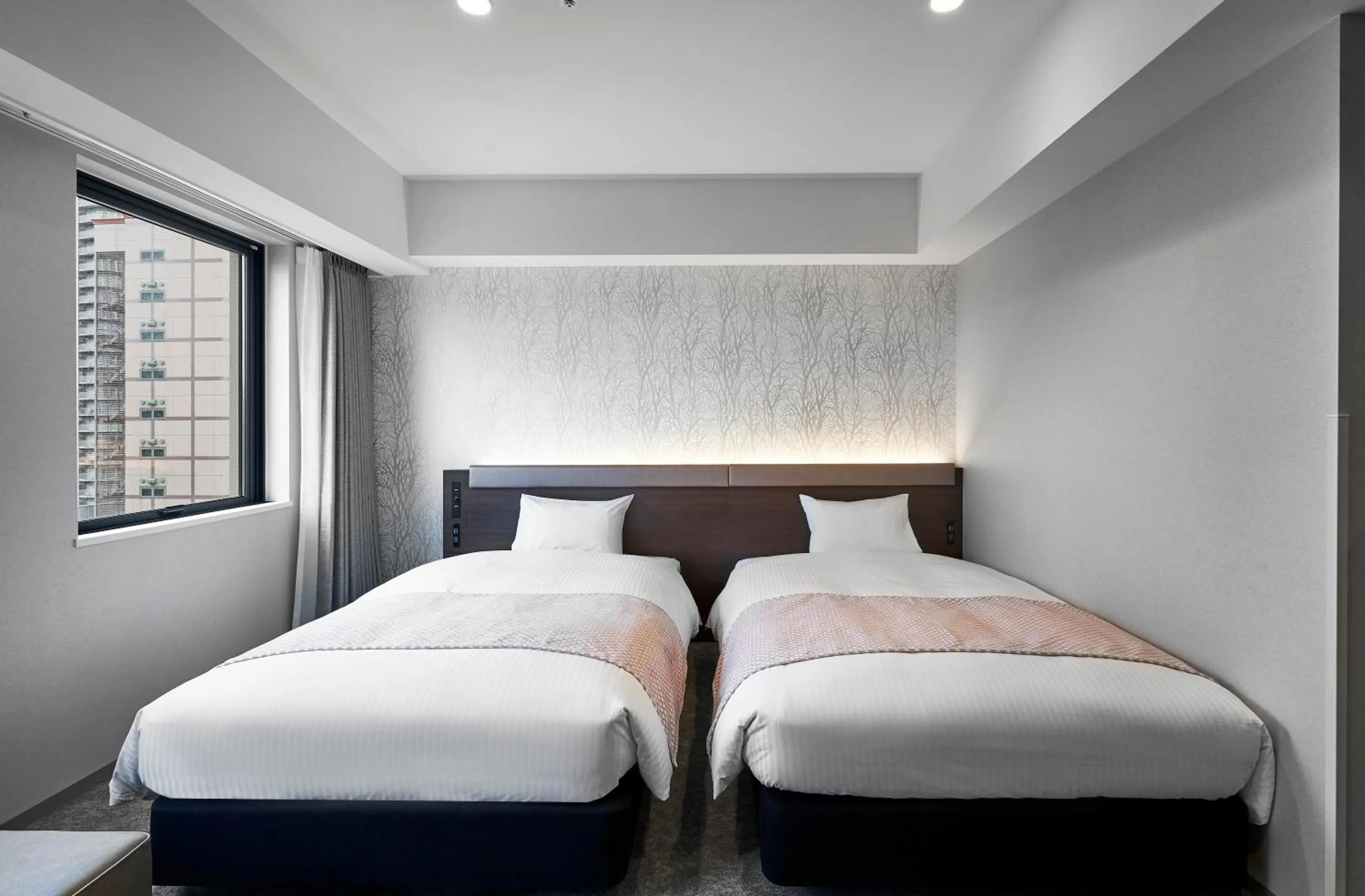 Photo of the whole room, Bed in Daiwa Roynet Hotel Sapporo Nakajima Koen