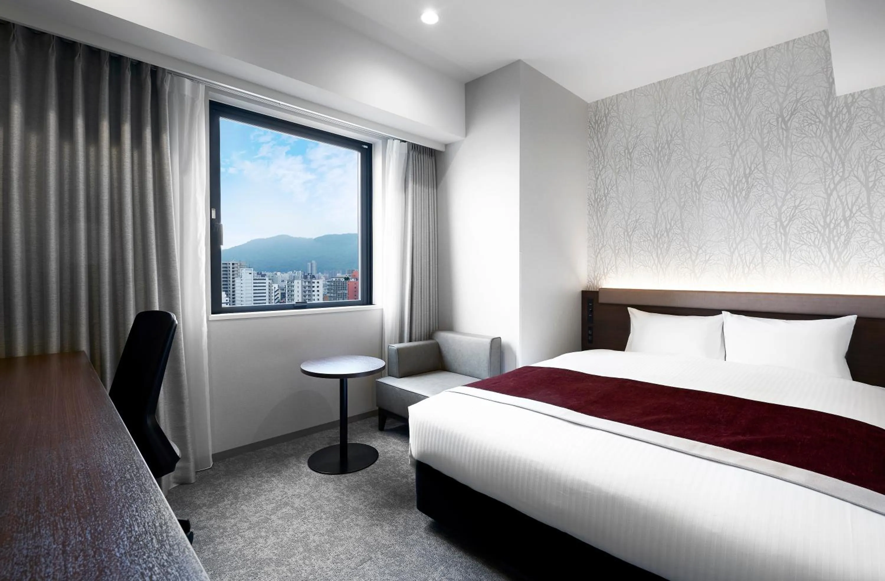 Photo of the whole room, Bed in Daiwa Roynet Hotel Sapporo Nakajima Koen