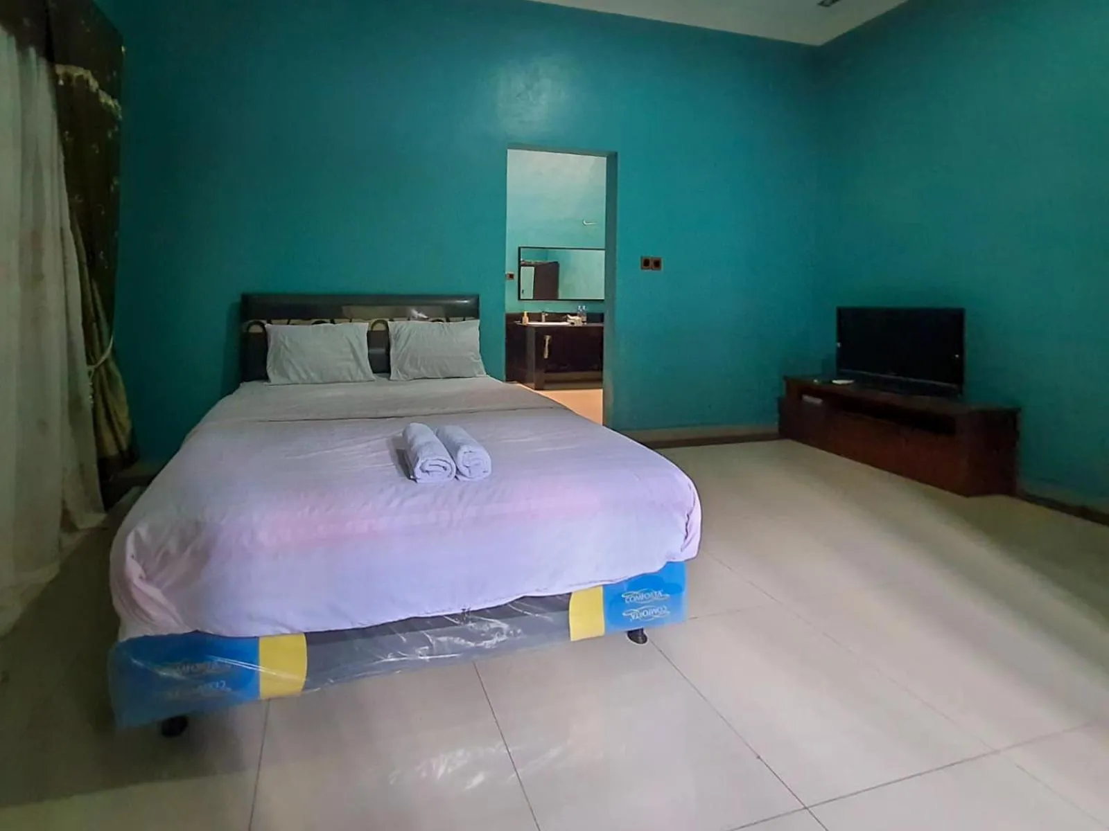 Bed in Pakde air cafe and homestay Grabag Magelang Mitra RedDoorz