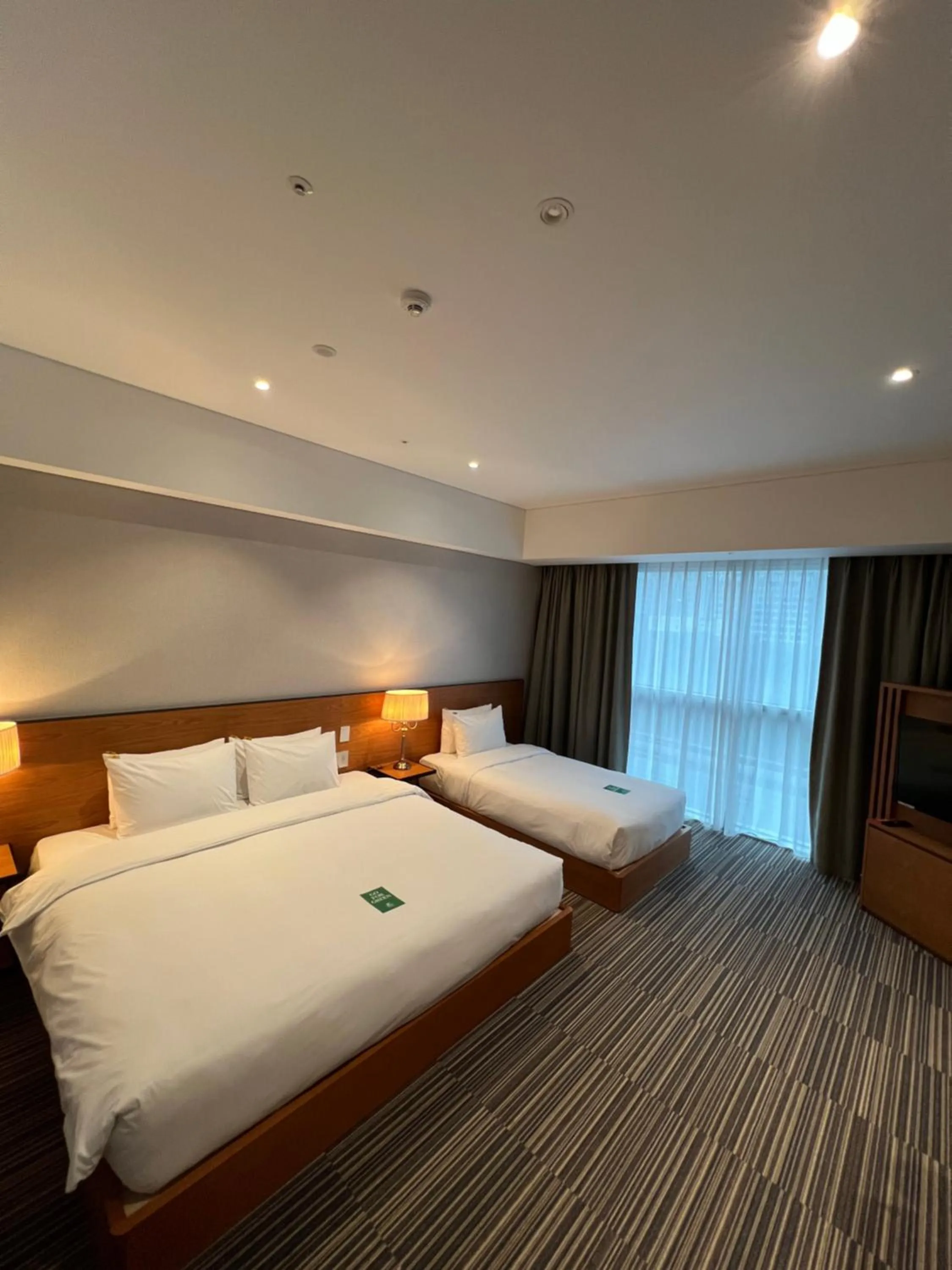 Bed in Hotel Tour Incheon Airport Hotel & Suites