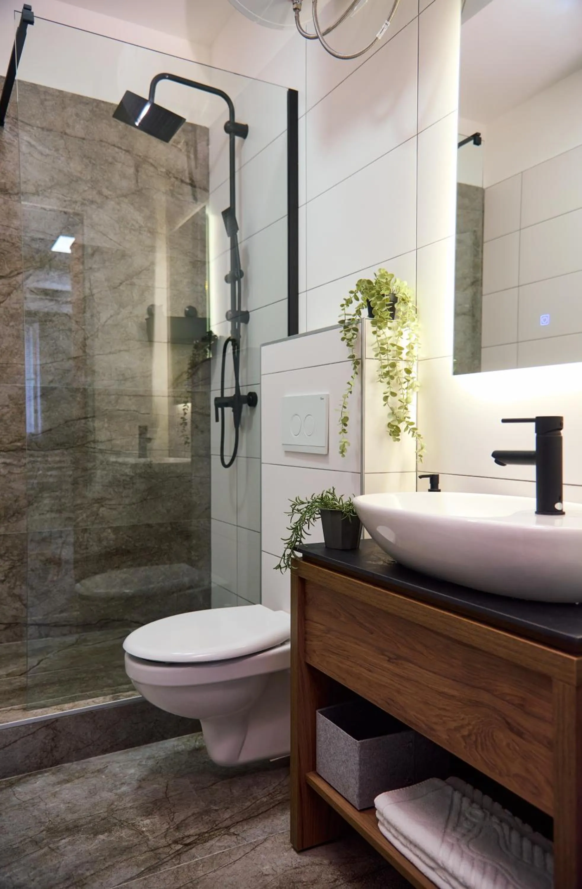 Bathroom in Manoir Apartments City Center