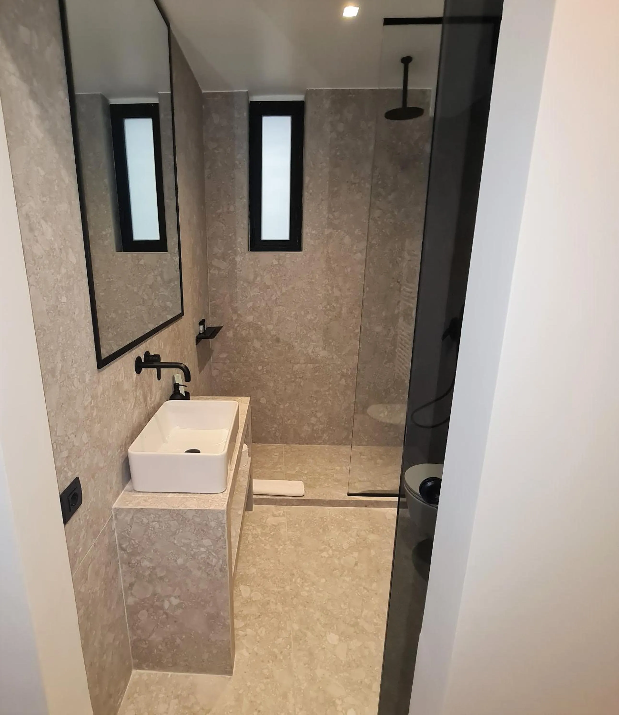 Shower in Cityzoe Athens Suites