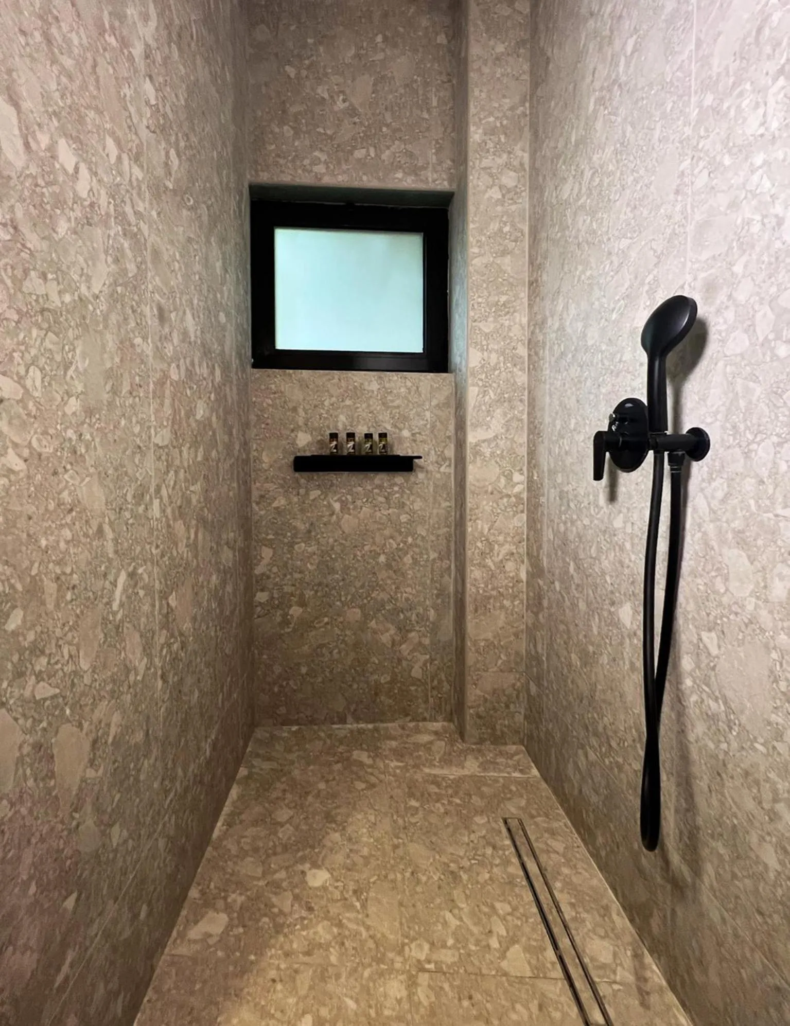 Shower in Cityzoe Athens Suites