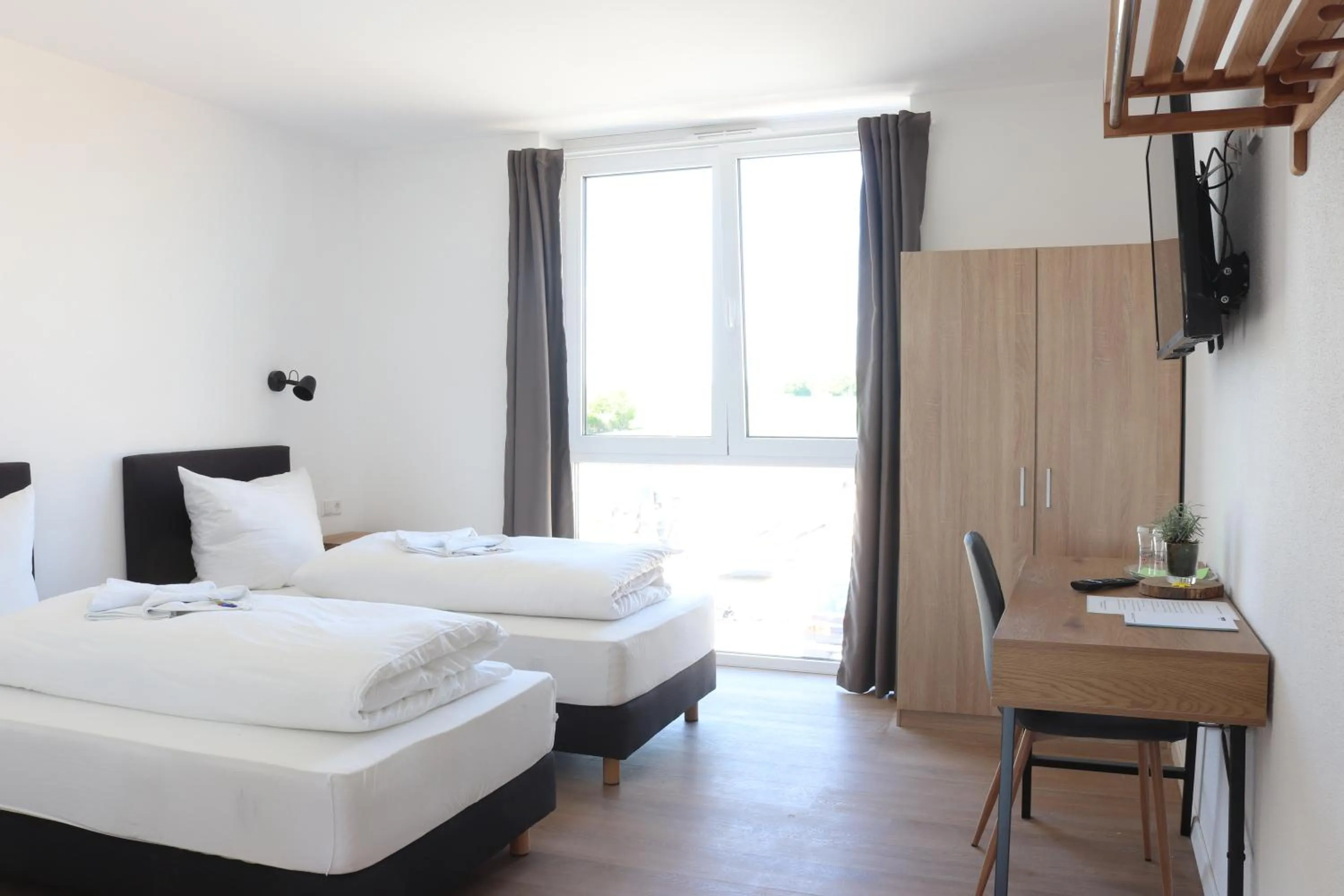 Bed in Motel Bergtheim - Self Check-in