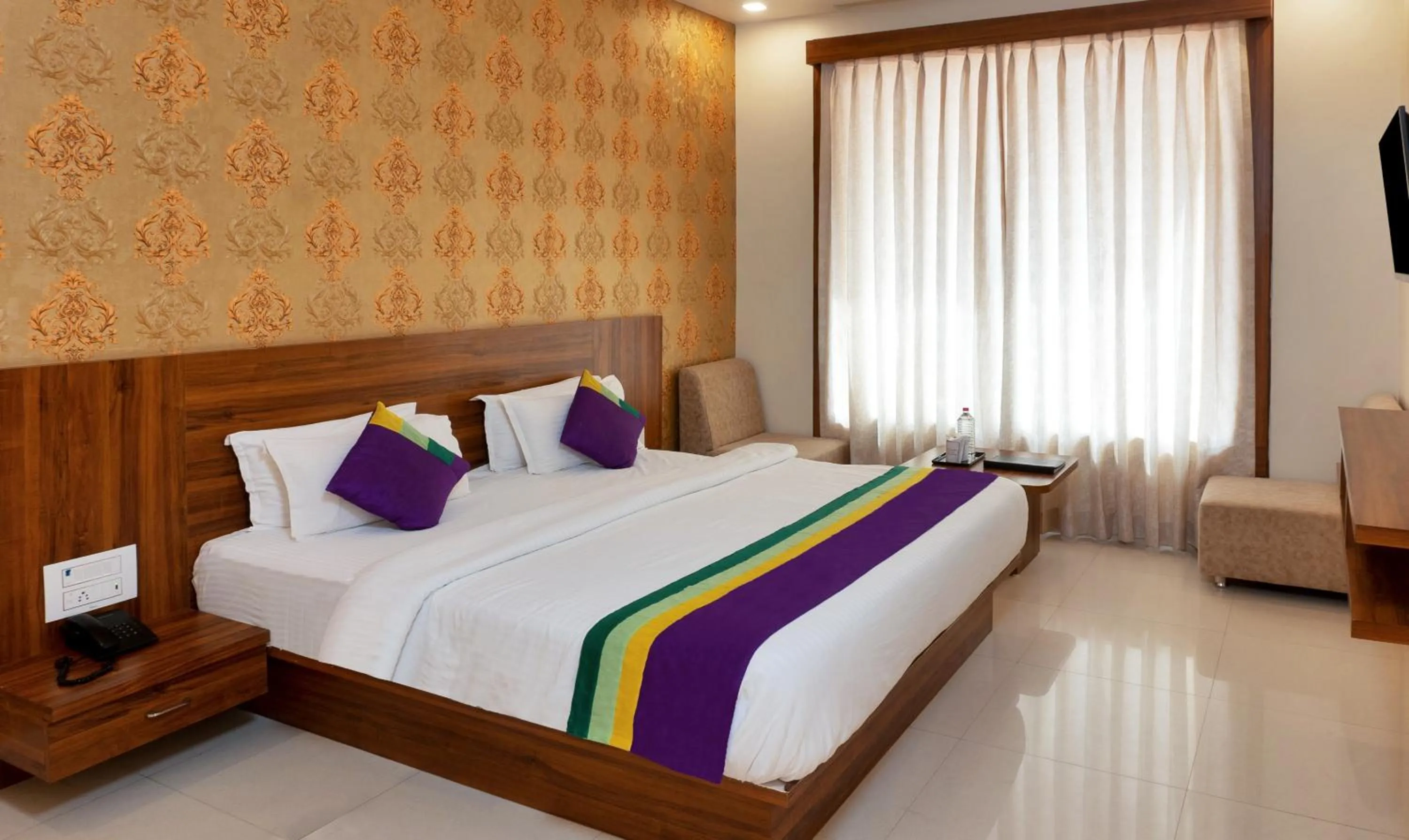 Bedroom, Bed in Treebo Premium Royal Amar With Mountain View and Swimming Pool