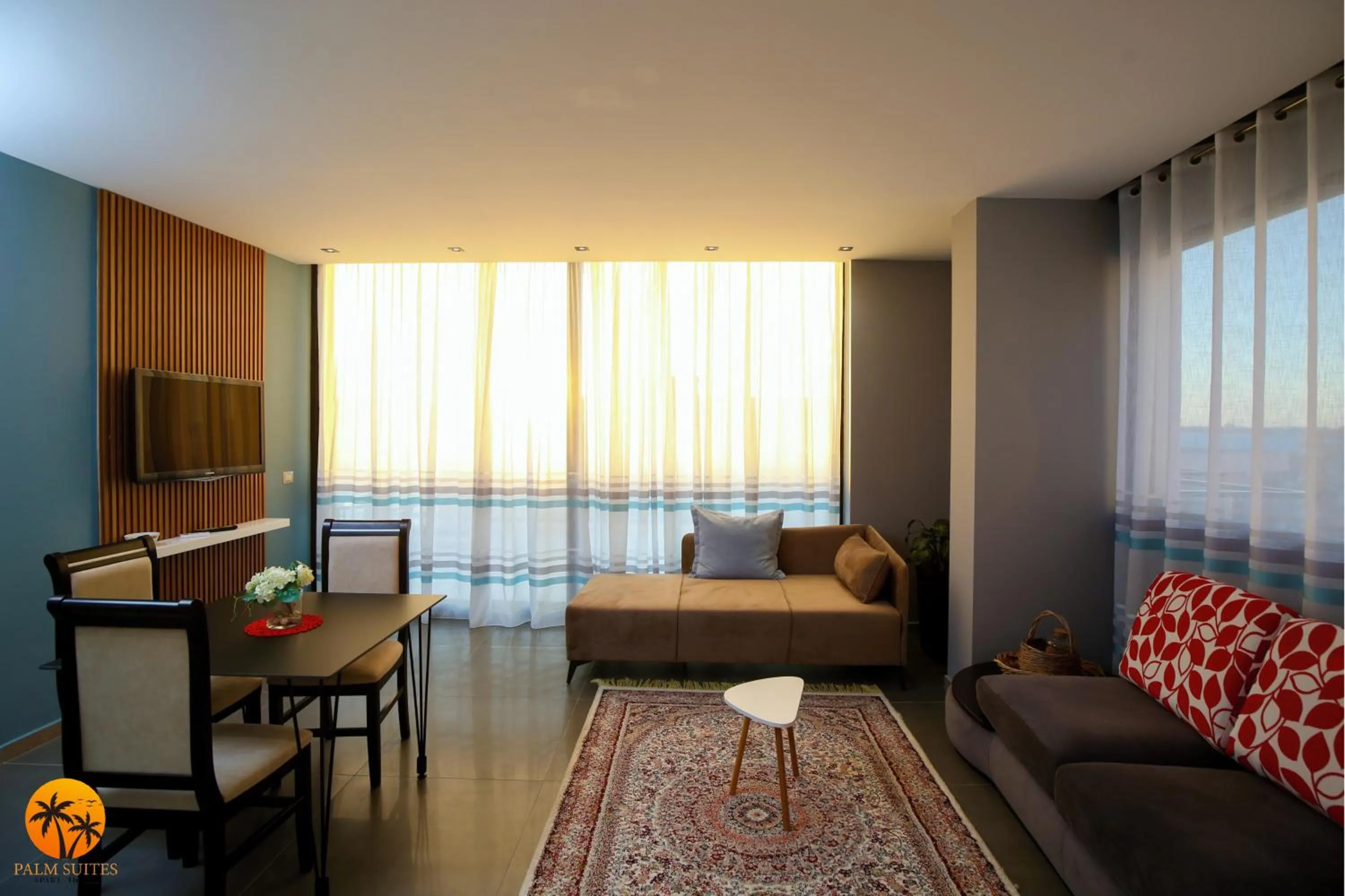 Living room in Palm Suites Apartment-Suite