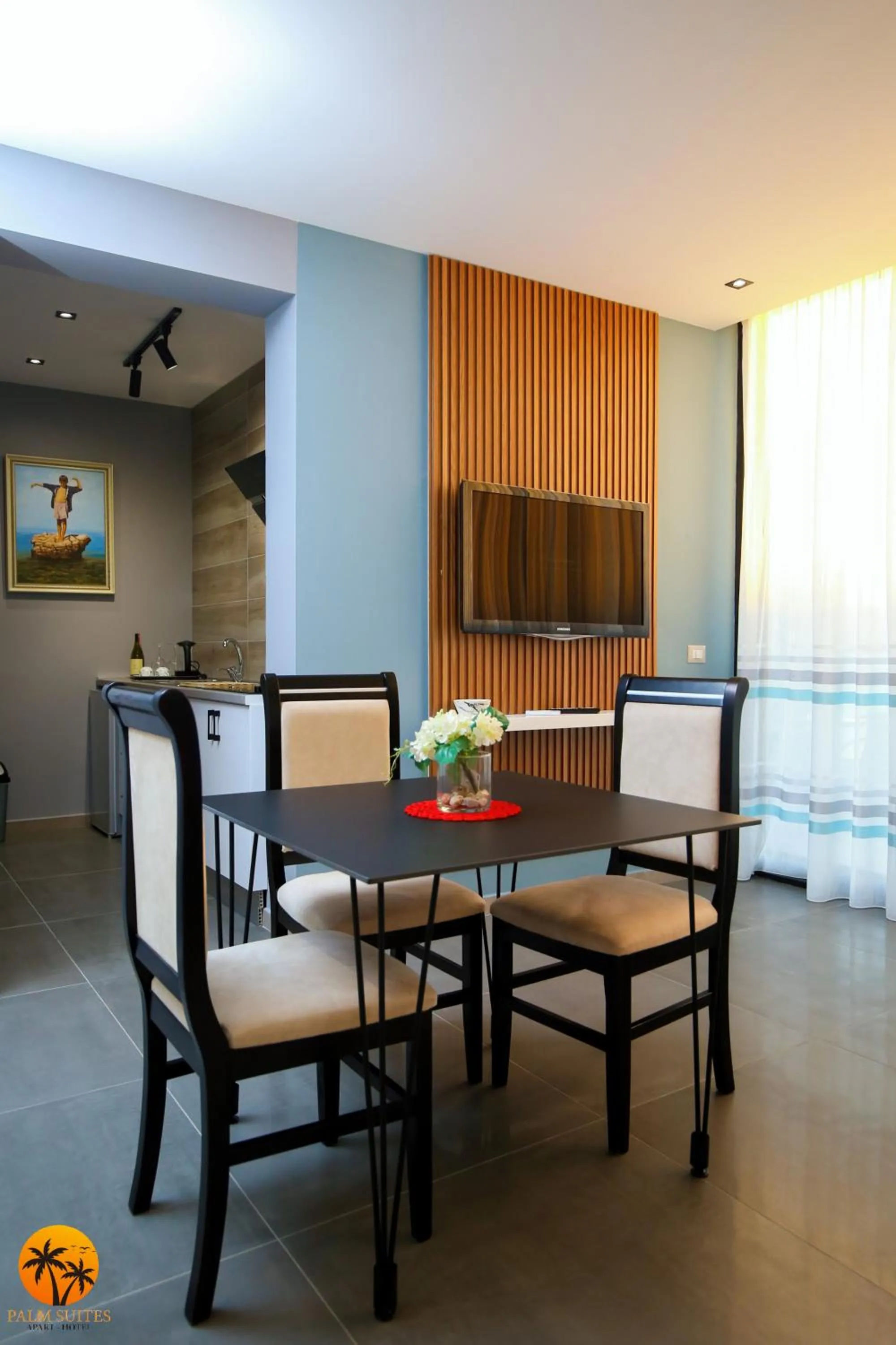 Living room in Palm Suites Apartment-Suite