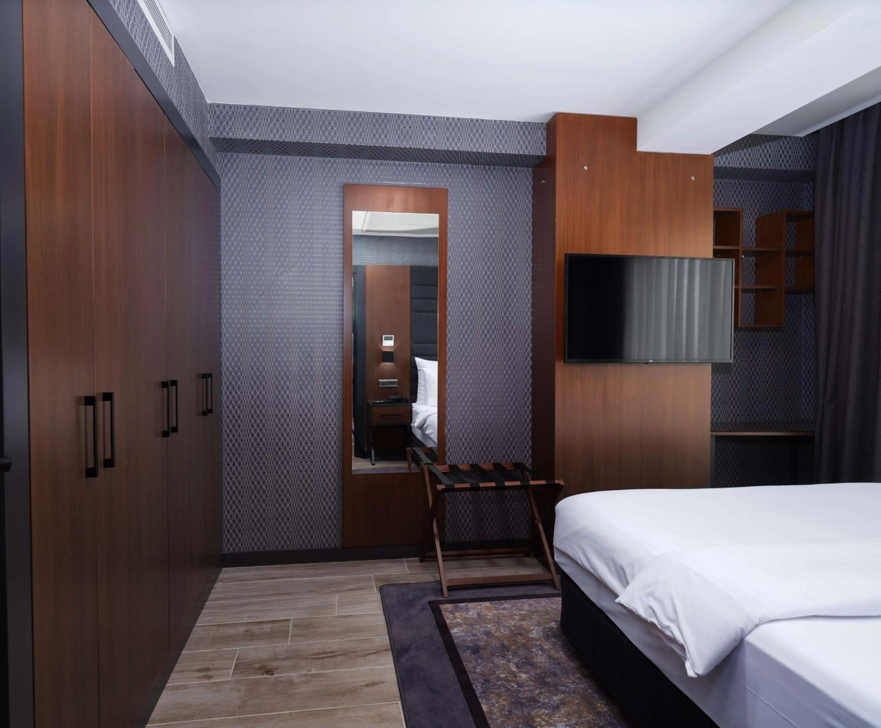 Photo of the whole room, Bed in Nova Vista Deluxe & Suites a Member of Radisson Individuals