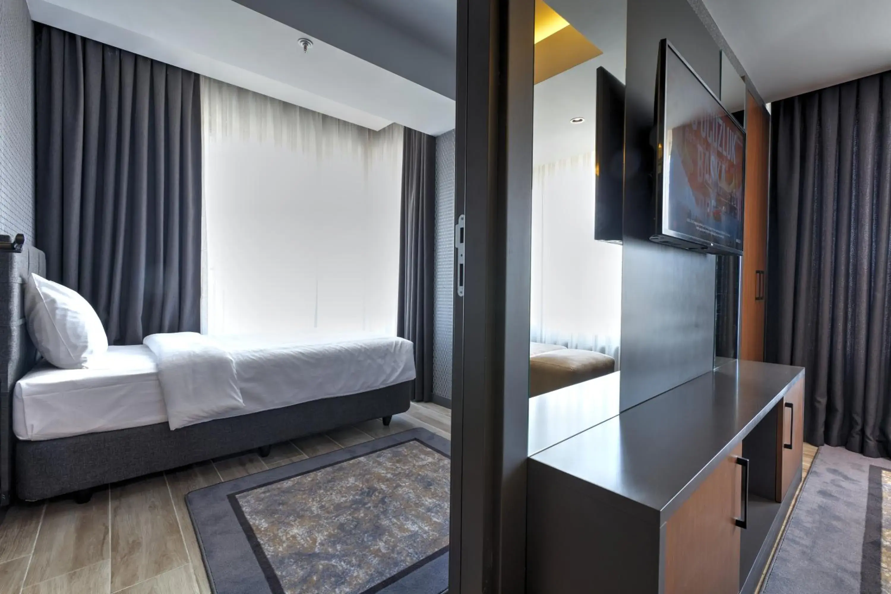 Two-Bedroom Suite with Kitchenette in Nova Vista Deluxe & Suites a Member of Radisson Individuals Two-Bedroom Suite with Kitchenette in Nova Vista Deluxe & Suites a Member of Radisson Individuals