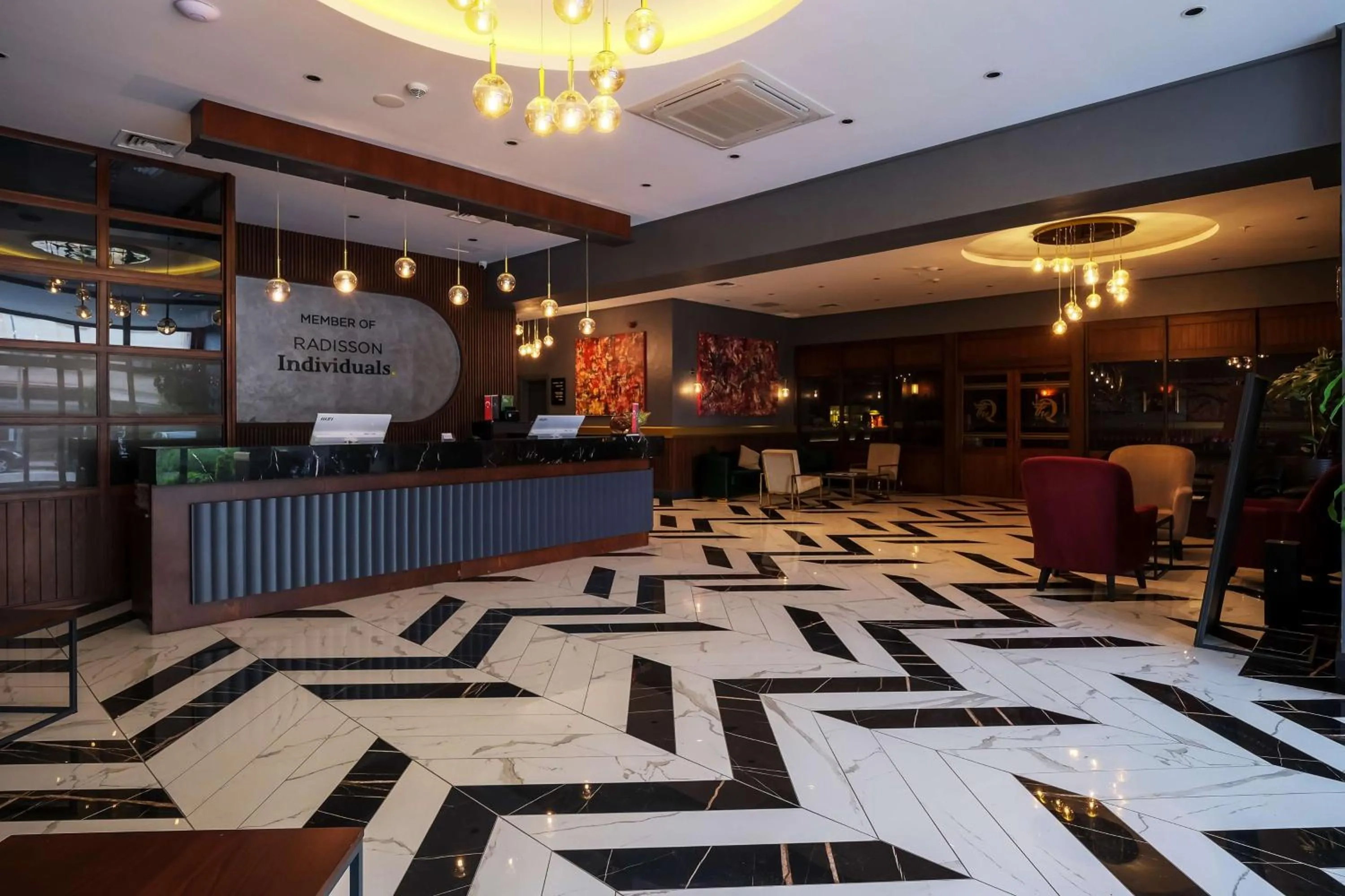 Lobby or reception in Nova Vista Deluxe & Suites a Member of Radisson Individuals