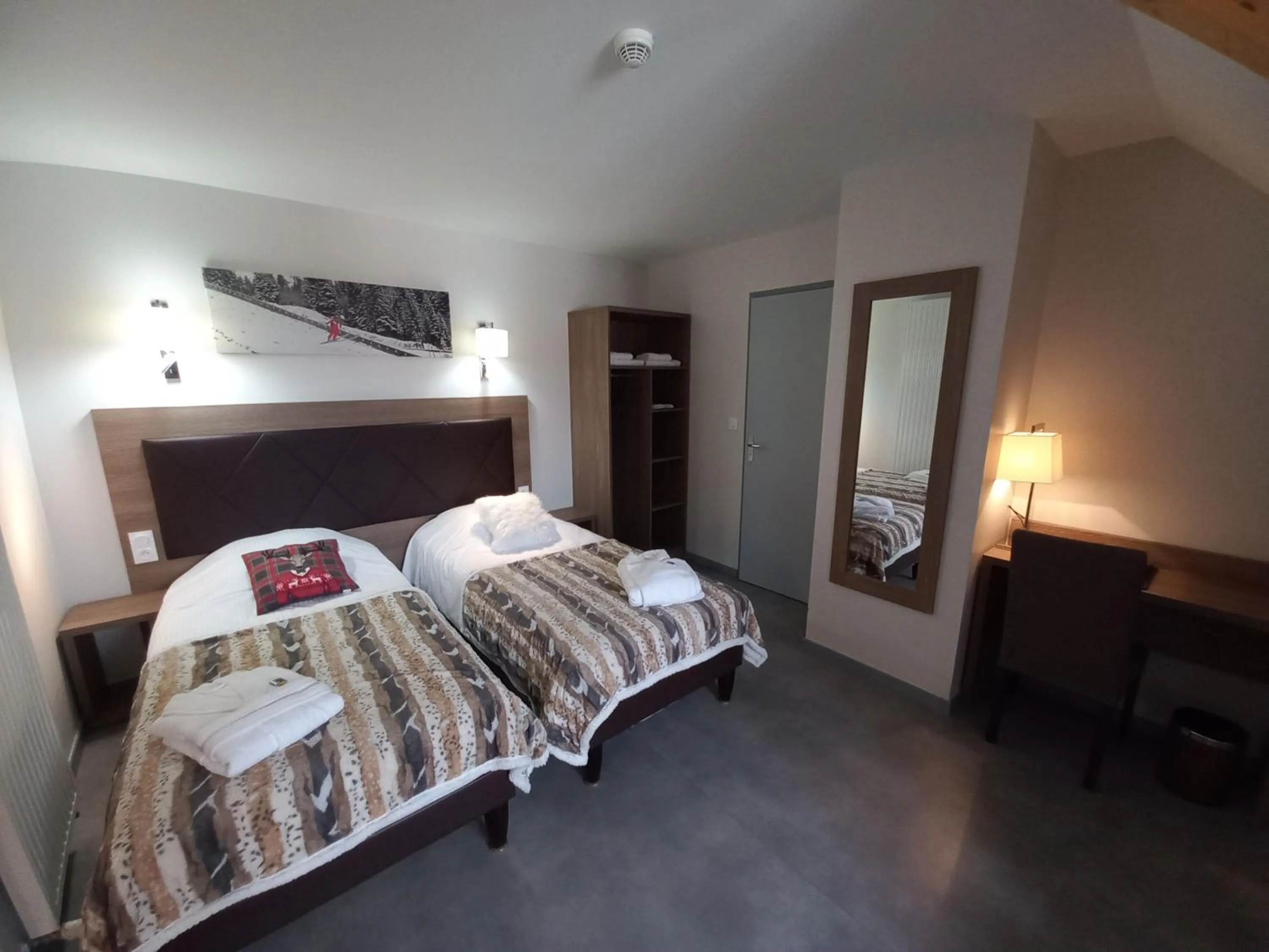 Bed in SARL DU PARC Hôtel Les Tremplins