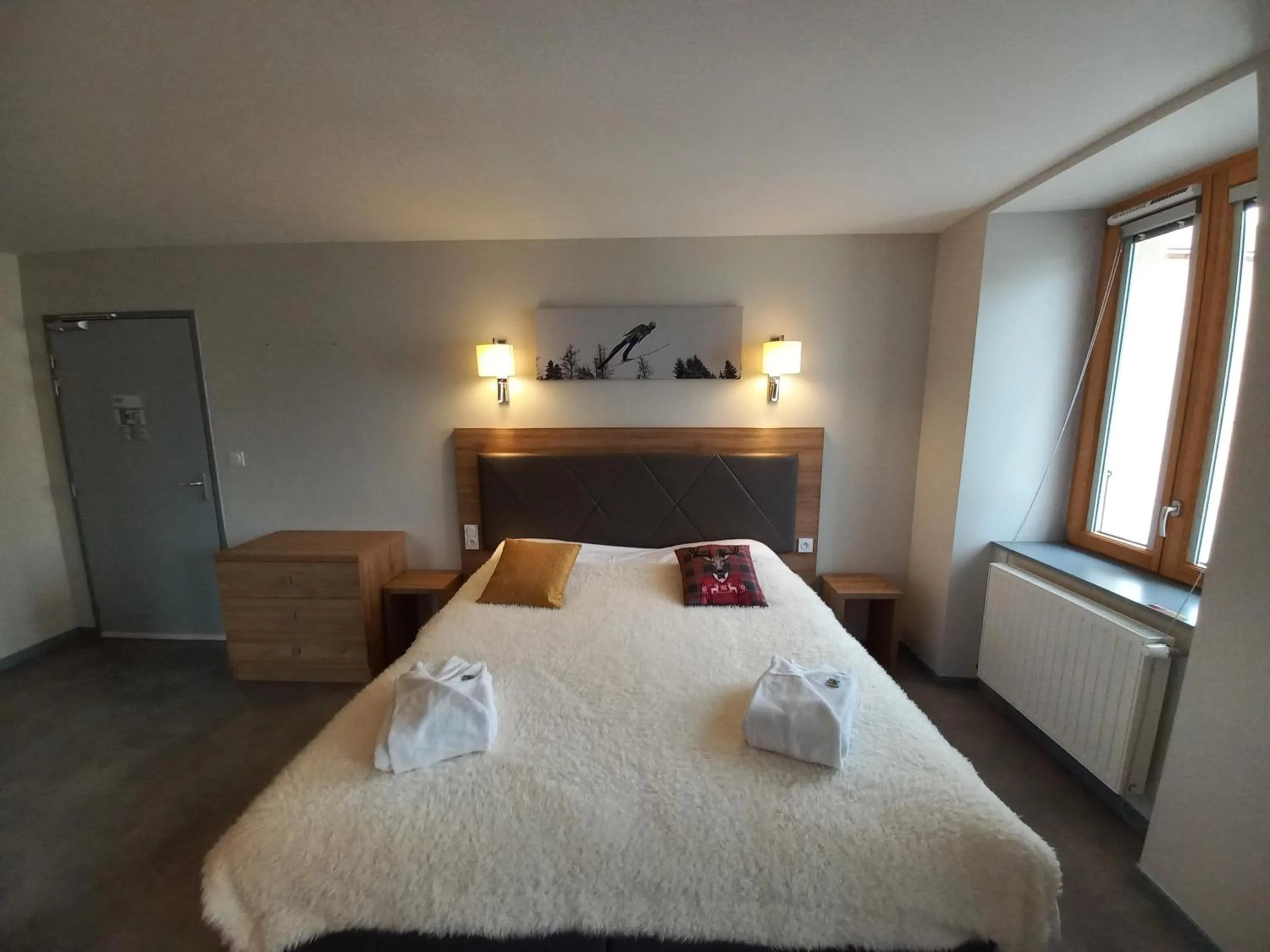 Bed in SARL DU PARC Hôtel Les Tremplins