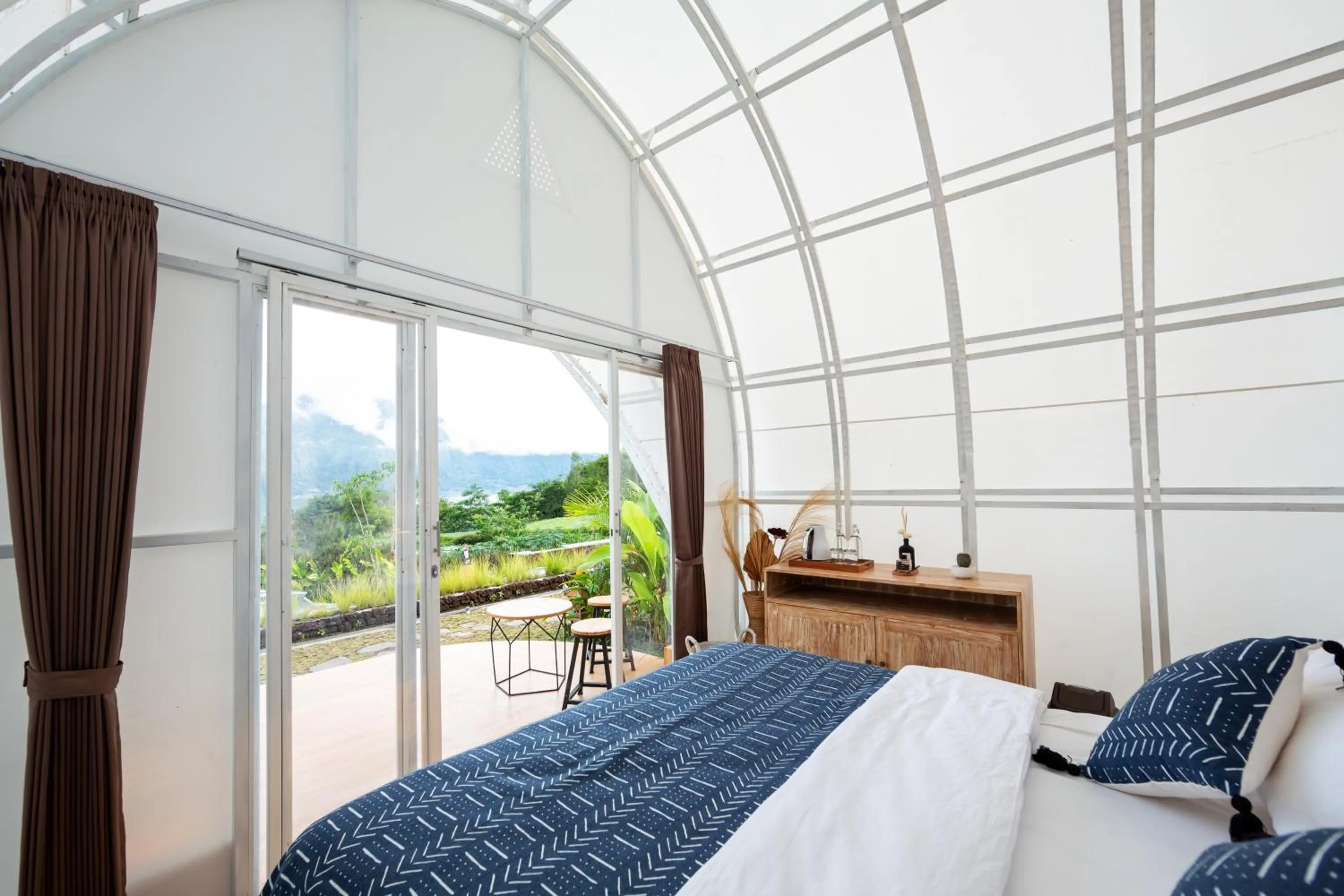 Bed in The Dewi Kintamani Luxury Glamping and Natural Hotspring
