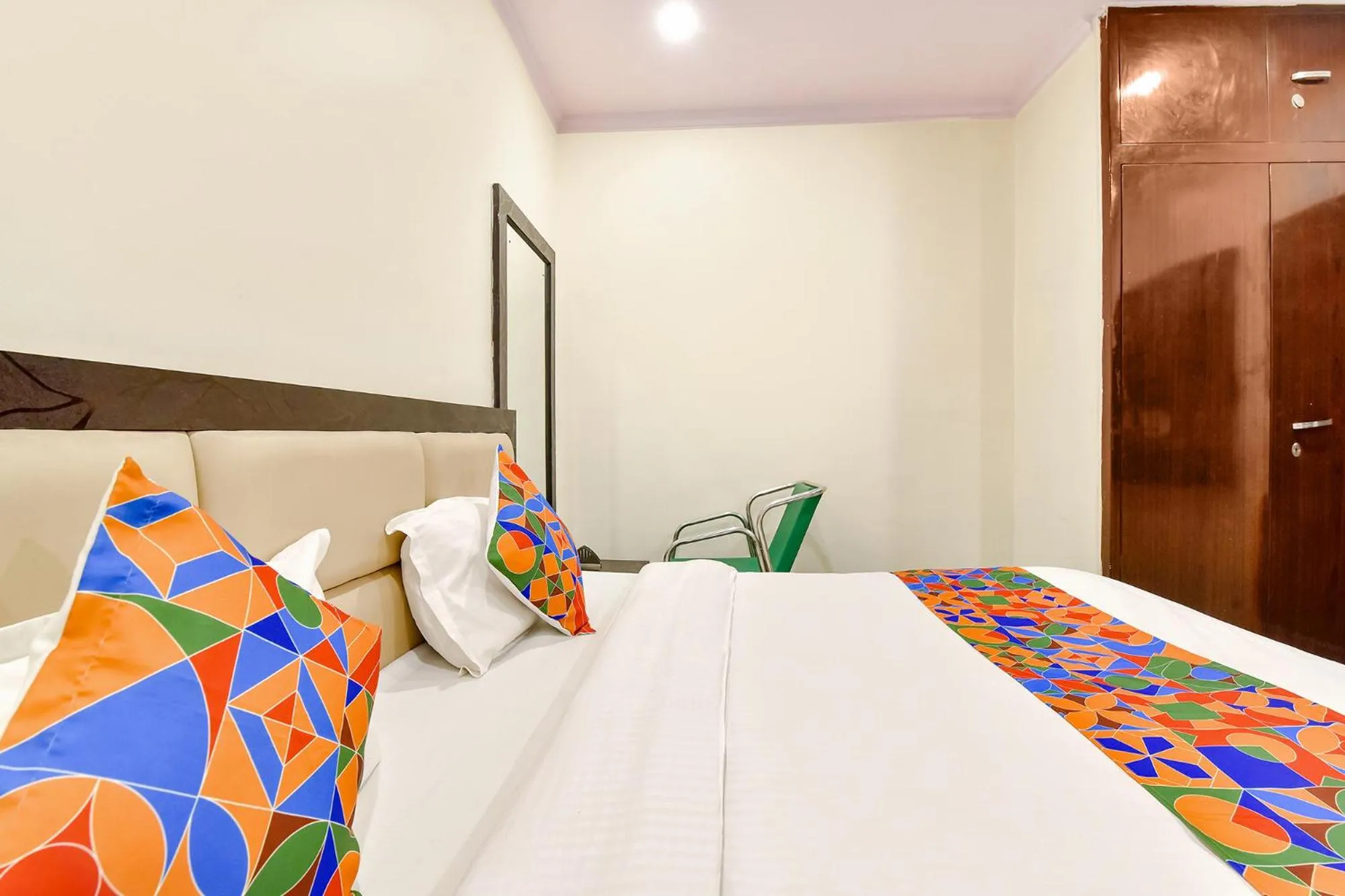 Bed in FabHotel Golden Leaf Mansarover