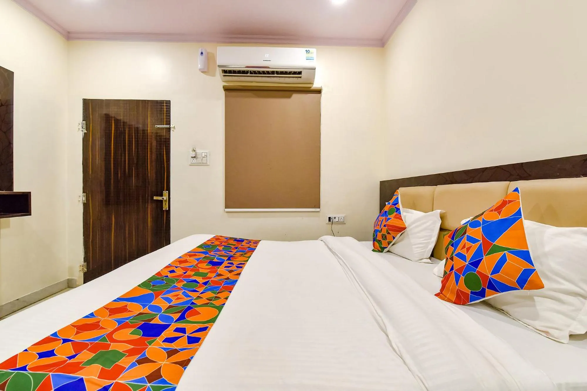 Bed in FabHotel Golden Leaf Mansarover