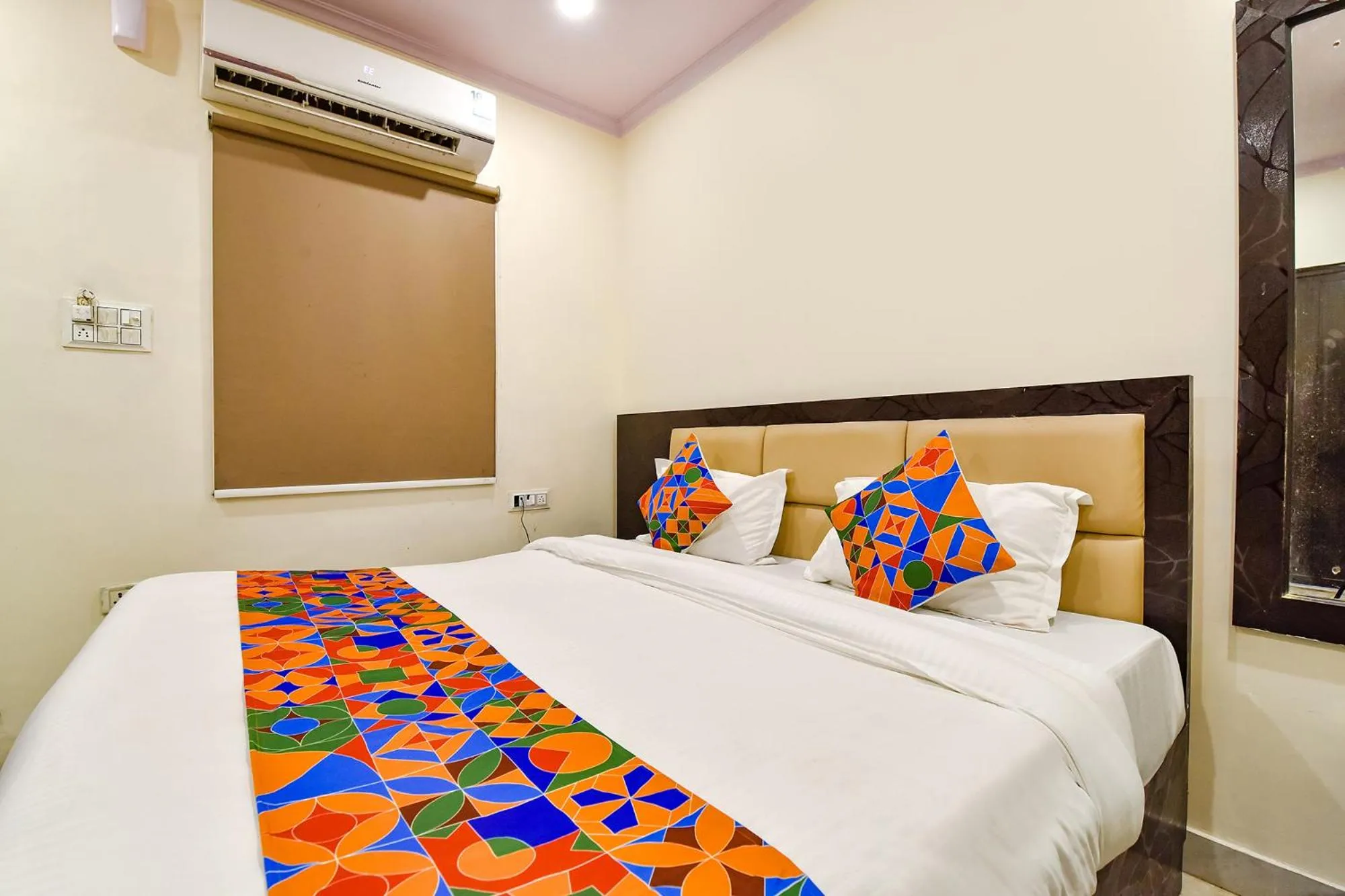 Bed in FabHotel Golden Leaf Mansarover