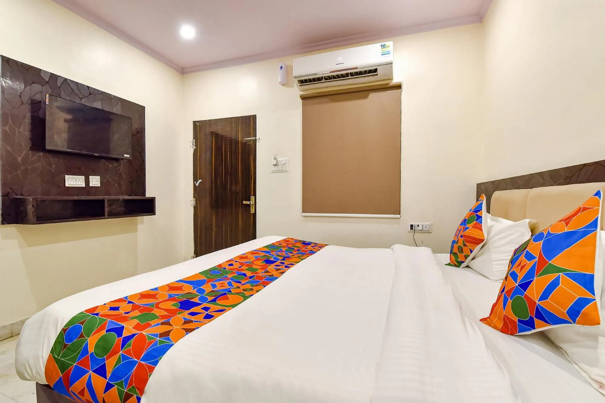 Bed in FabHotel Golden Leaf Mansarover