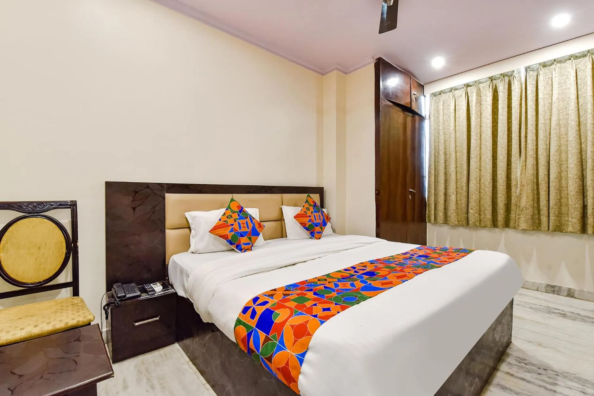 Bed in FabHotel Golden Leaf Mansarover