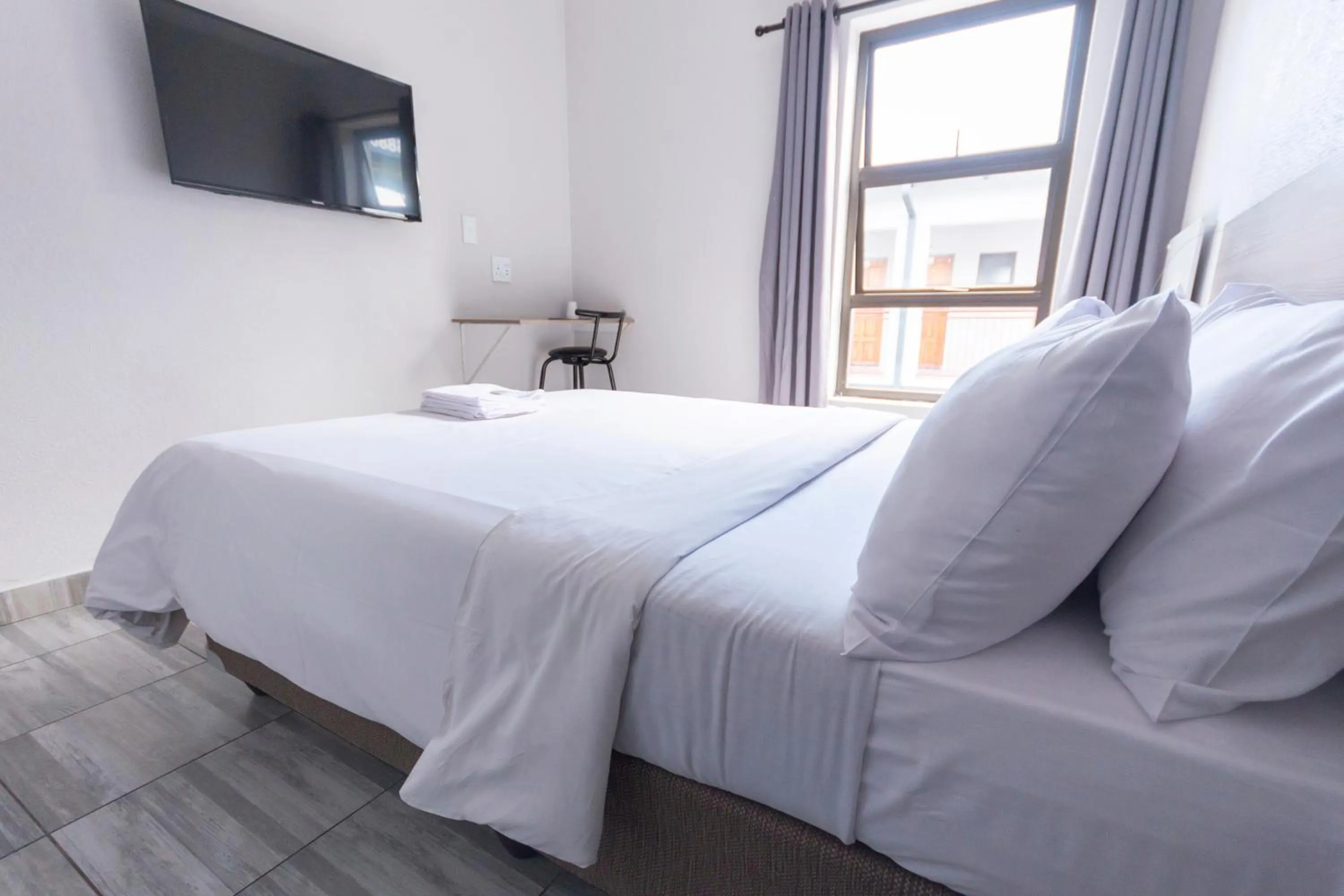 Bed in Ecomotel O.R.Tambo