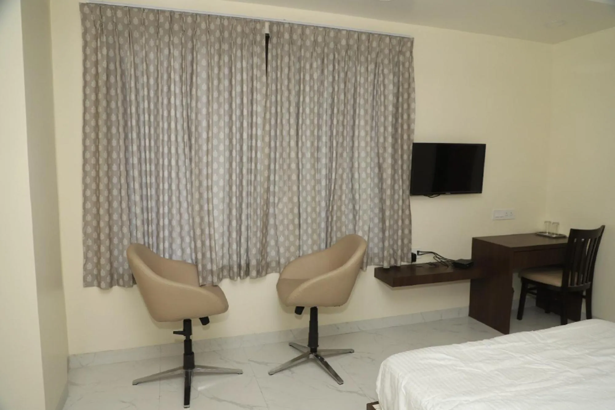 Seating area, Bed in ID Square residency Parbhani